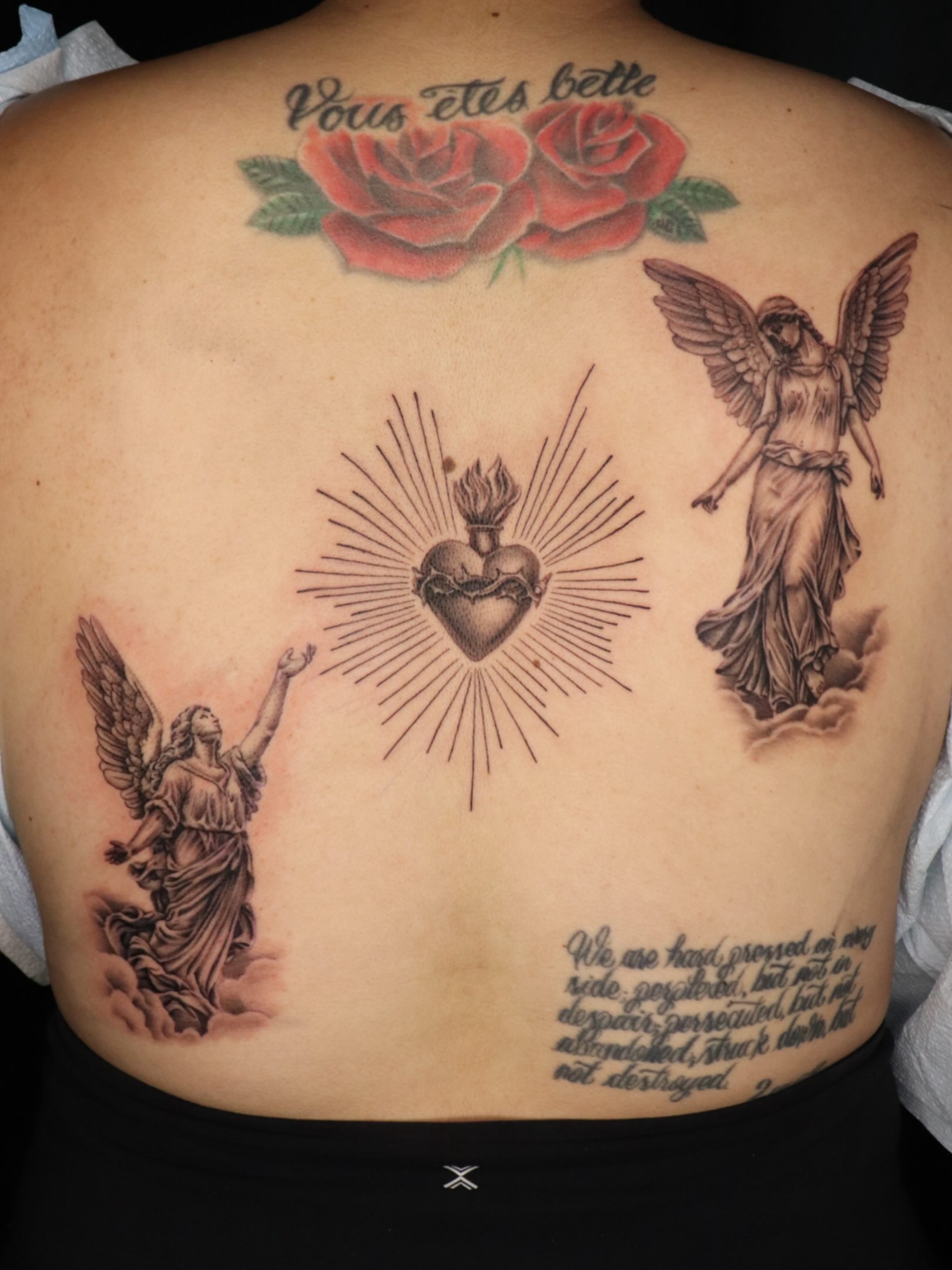 Religious symbolism realism tattoo on the back by Daniel Rodriguez