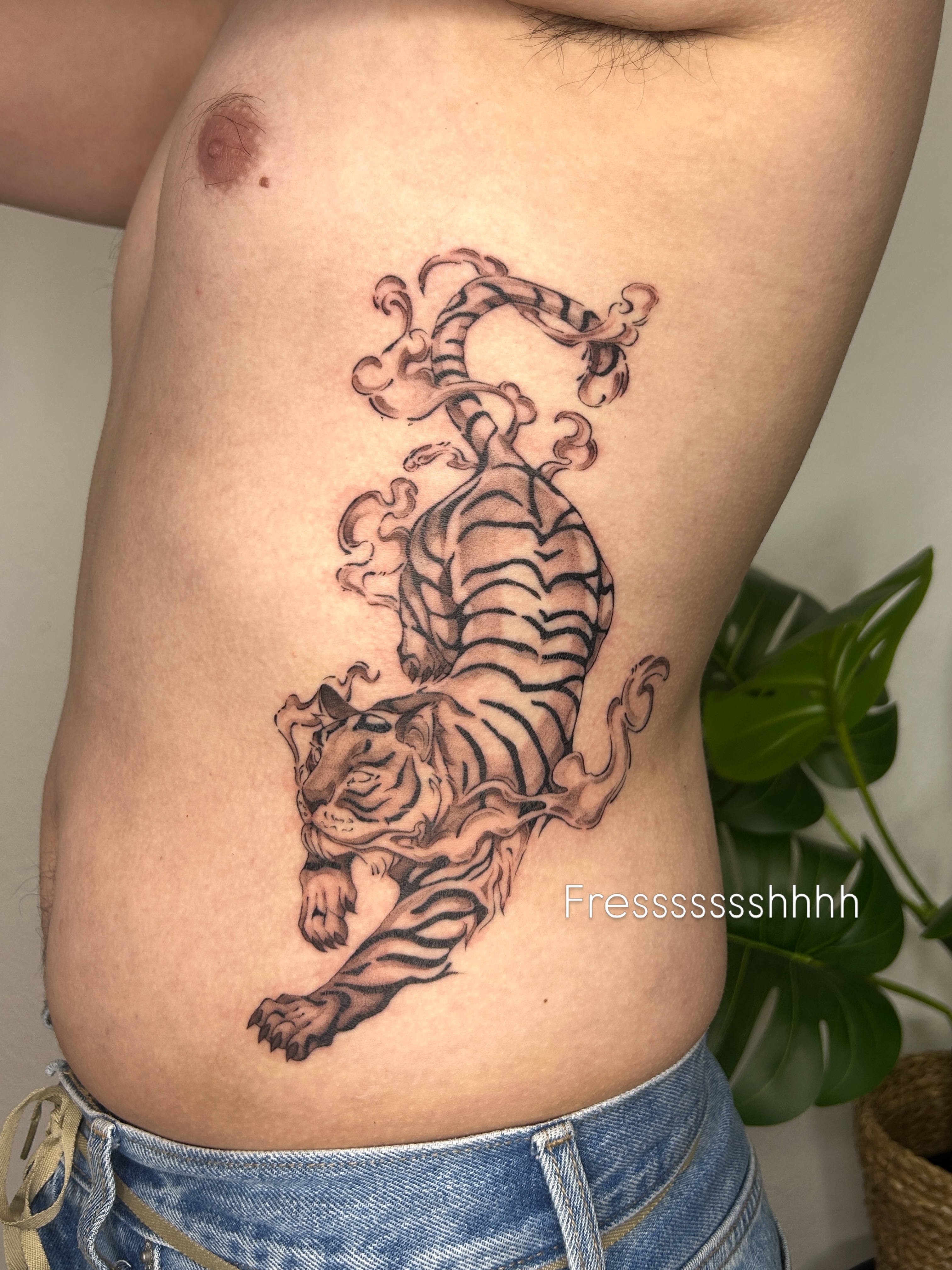 Tiger black and grey tattoo on the ribs by Miri