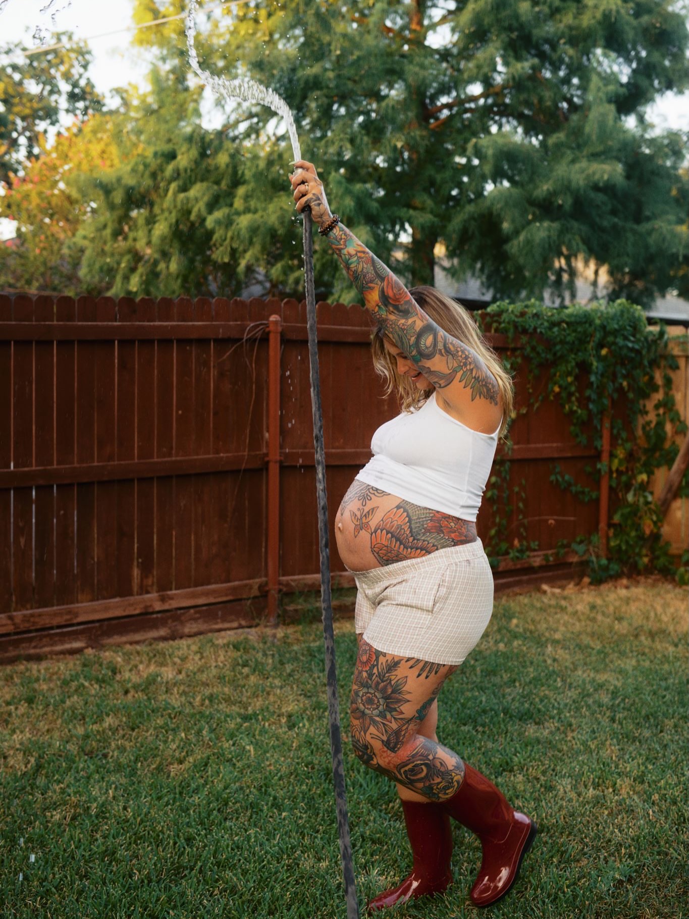Pregnant belly American traditional tattoo on the torso by Brieana Smith