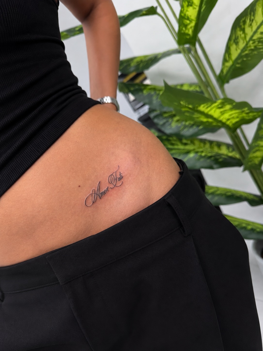 Script lettering lettering script tattoo on the thigh by Lina Valentina, New York, New York