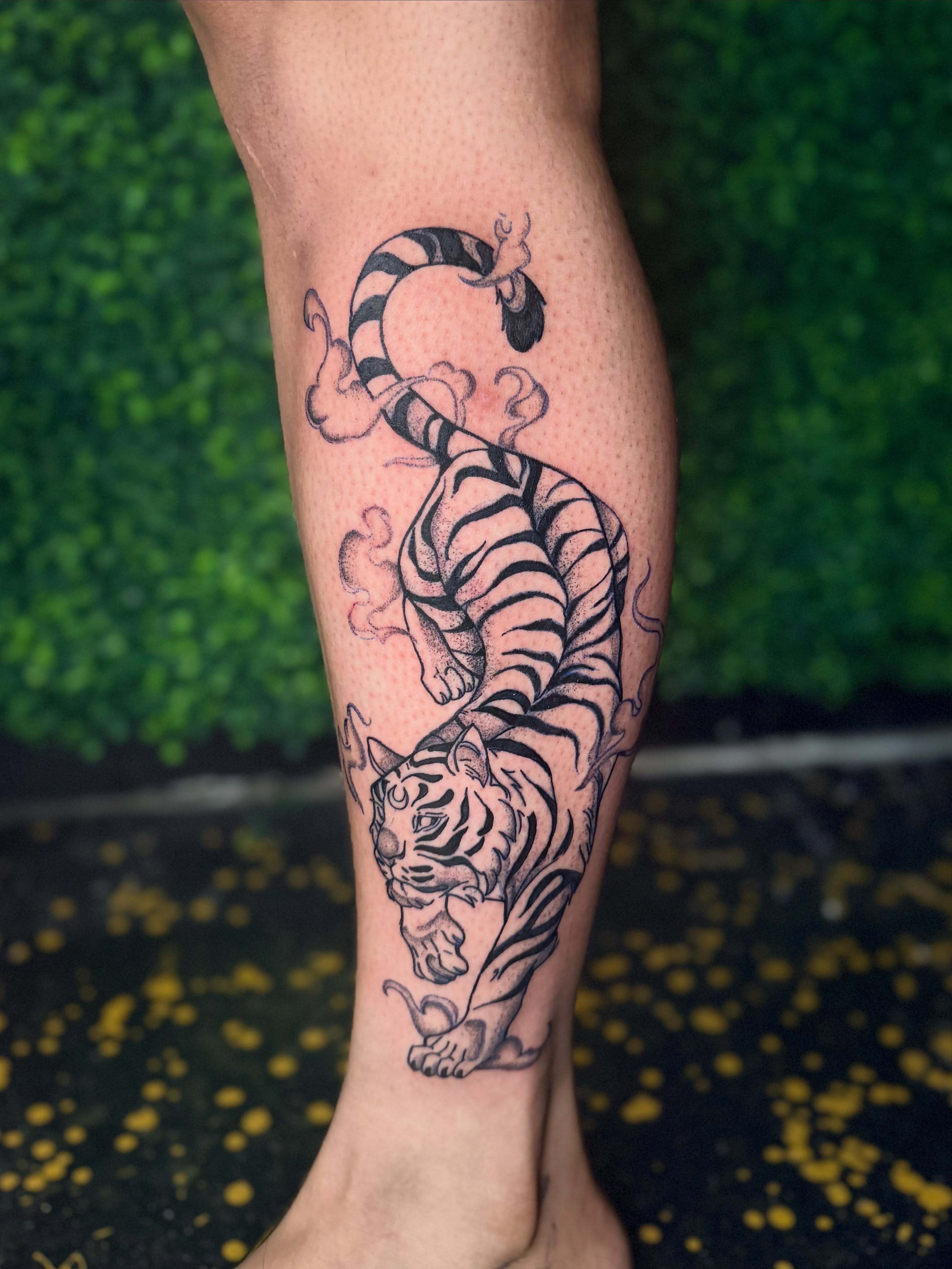 Tiger dotwork tattoo on the calf by Alesia