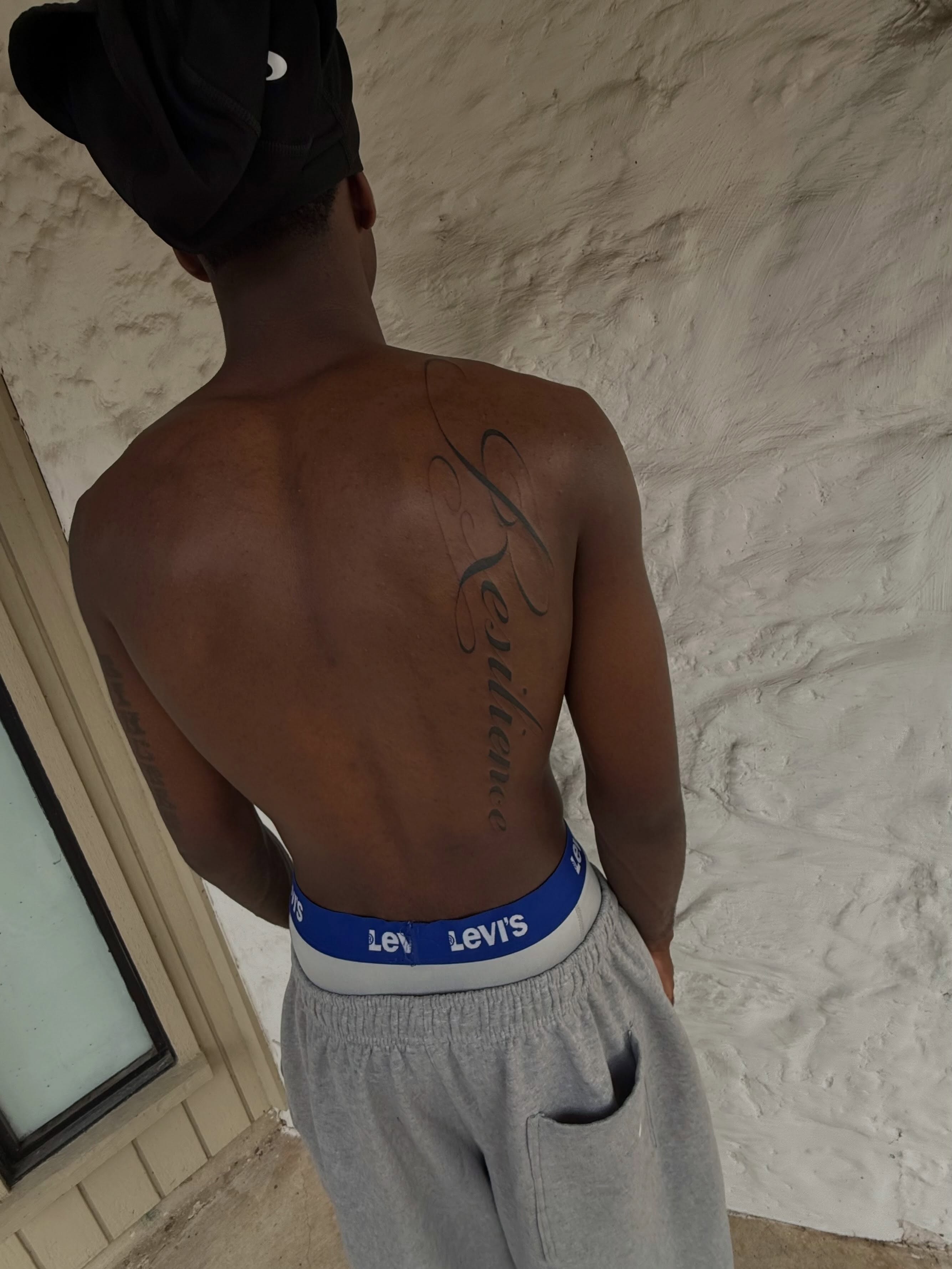 Script lettering lettering script tattoo on the back by sarah