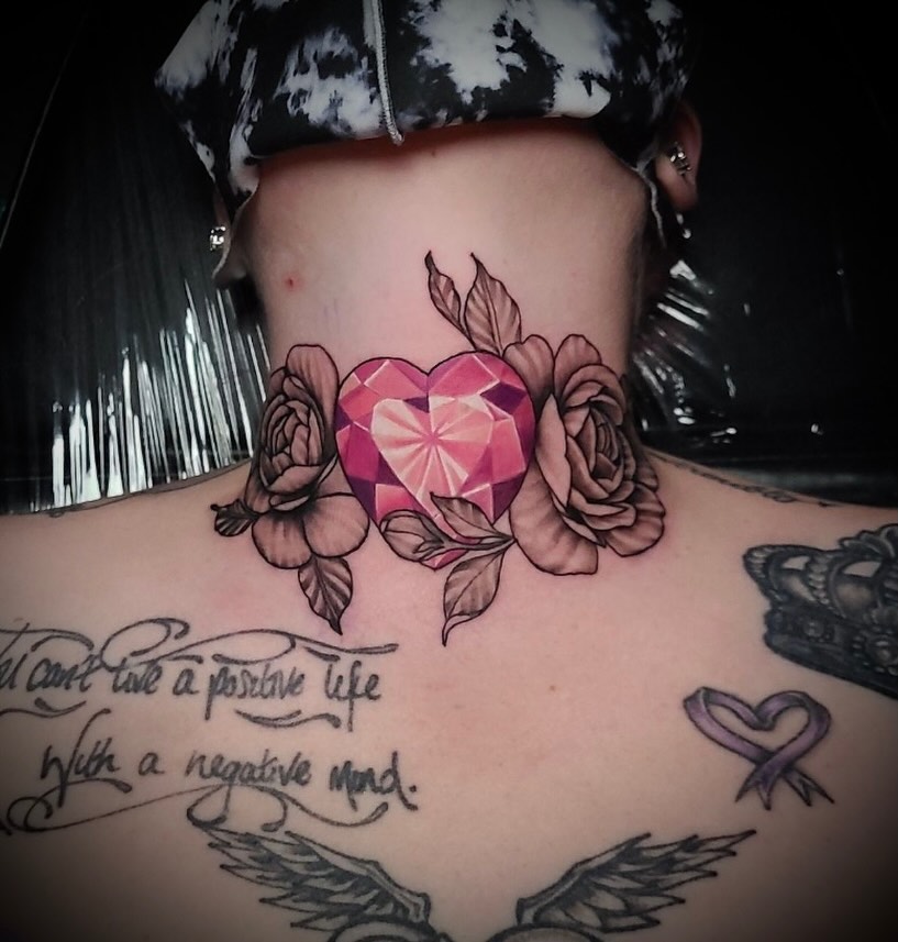 Heart with roses geometric tattoo on the back by Exis LHinc, Miami, Florida