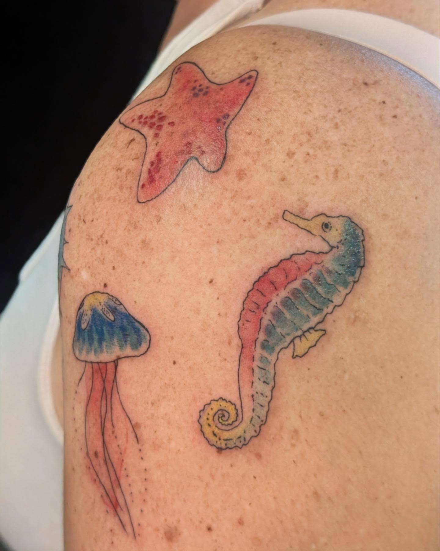 Seahorse and jellyfish new school tattoo on the shoulder by Ari 💠🧜‍♂️🐟🎨🦑🐚💠