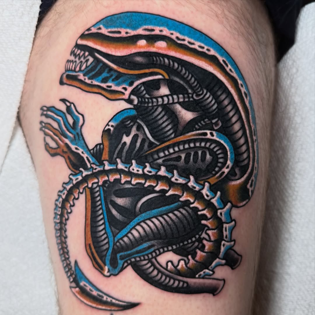 Alien xenomorph American traditional tattoo on the thigh by Dani Johnson