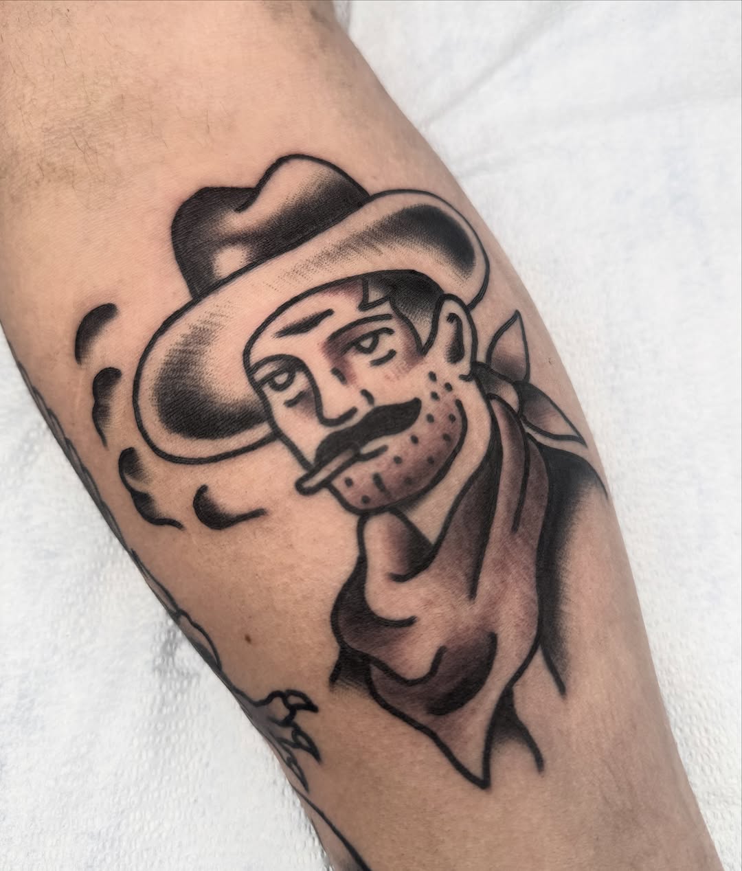 Man with hat smoking American traditional tattoo on the forearm by Drew🕸️, Phoenix, Arizona
