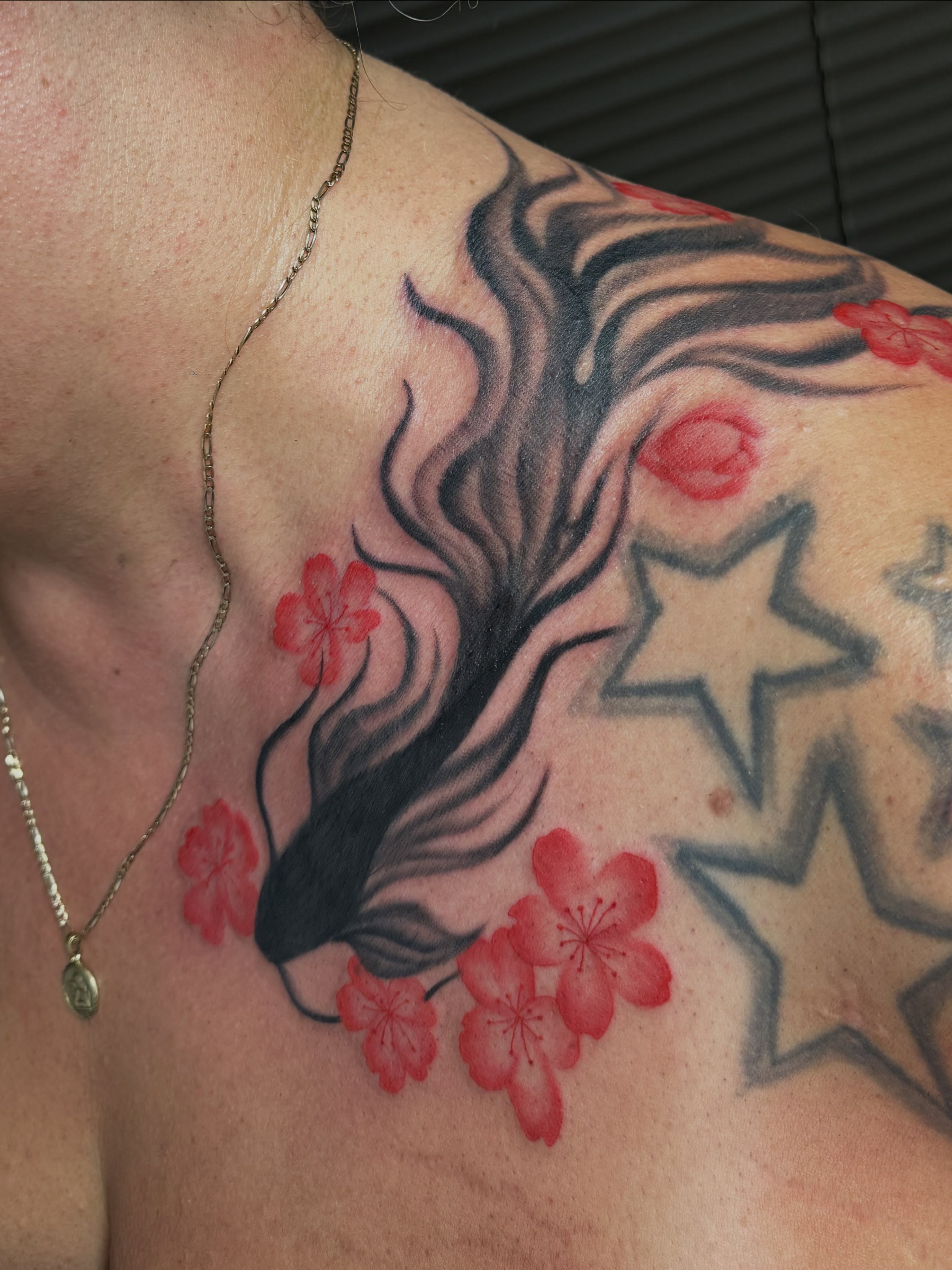 Koi fish and cherry blossoms japanese irezumi tattoo on the shoulder by Royal Martinez