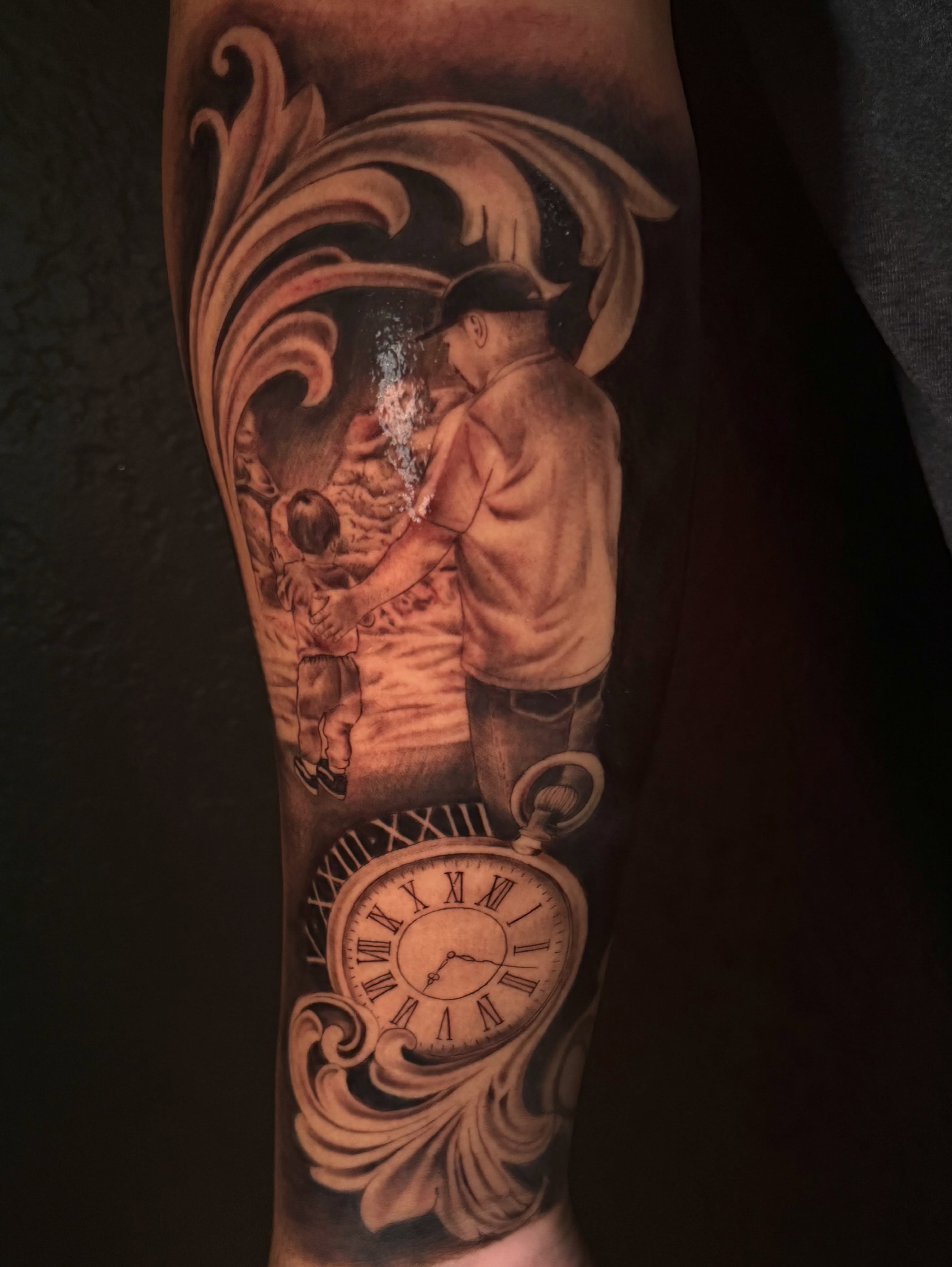 Father and child realism tattoo on the forearm by Faith Lopez