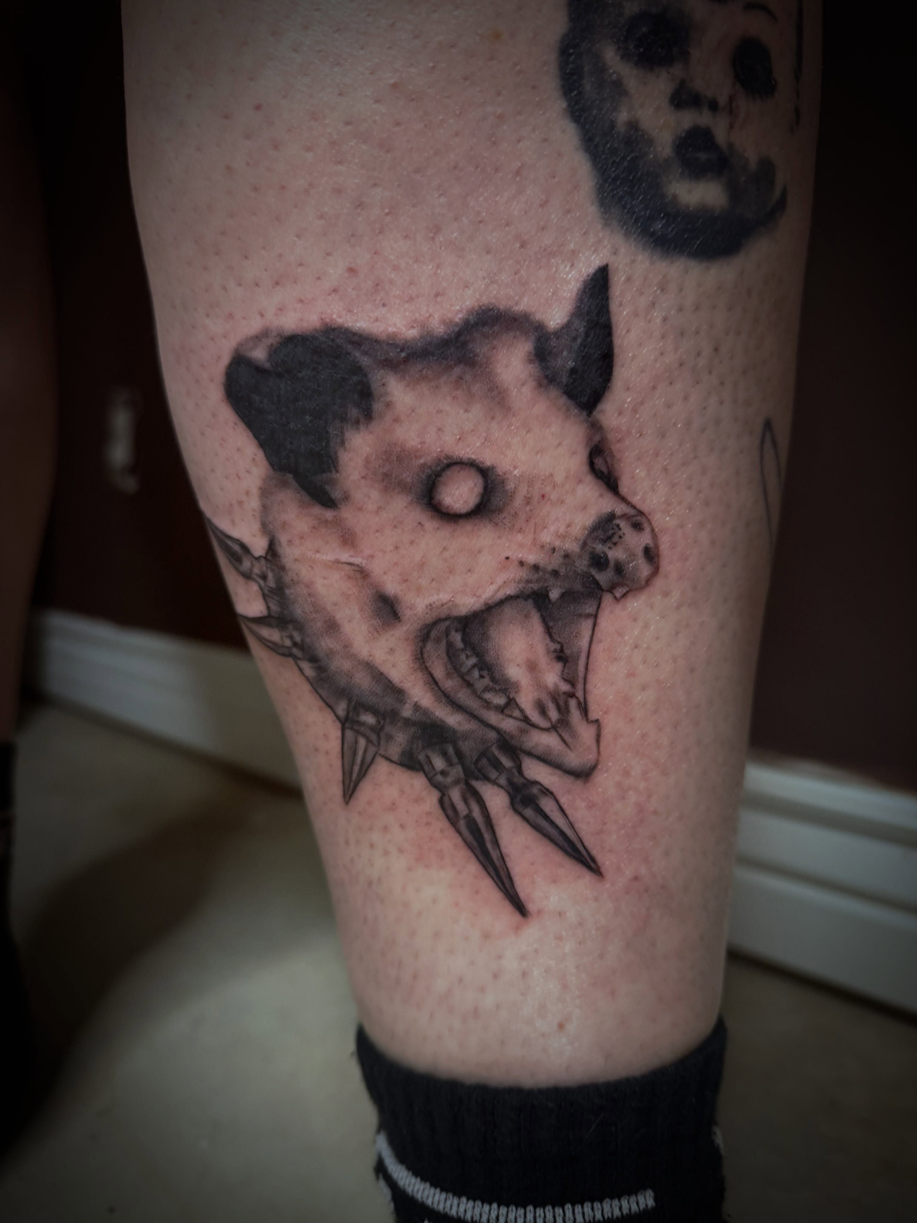 Pig with spikes black and grey tattoo on the forearm by Kaylee 🗡️