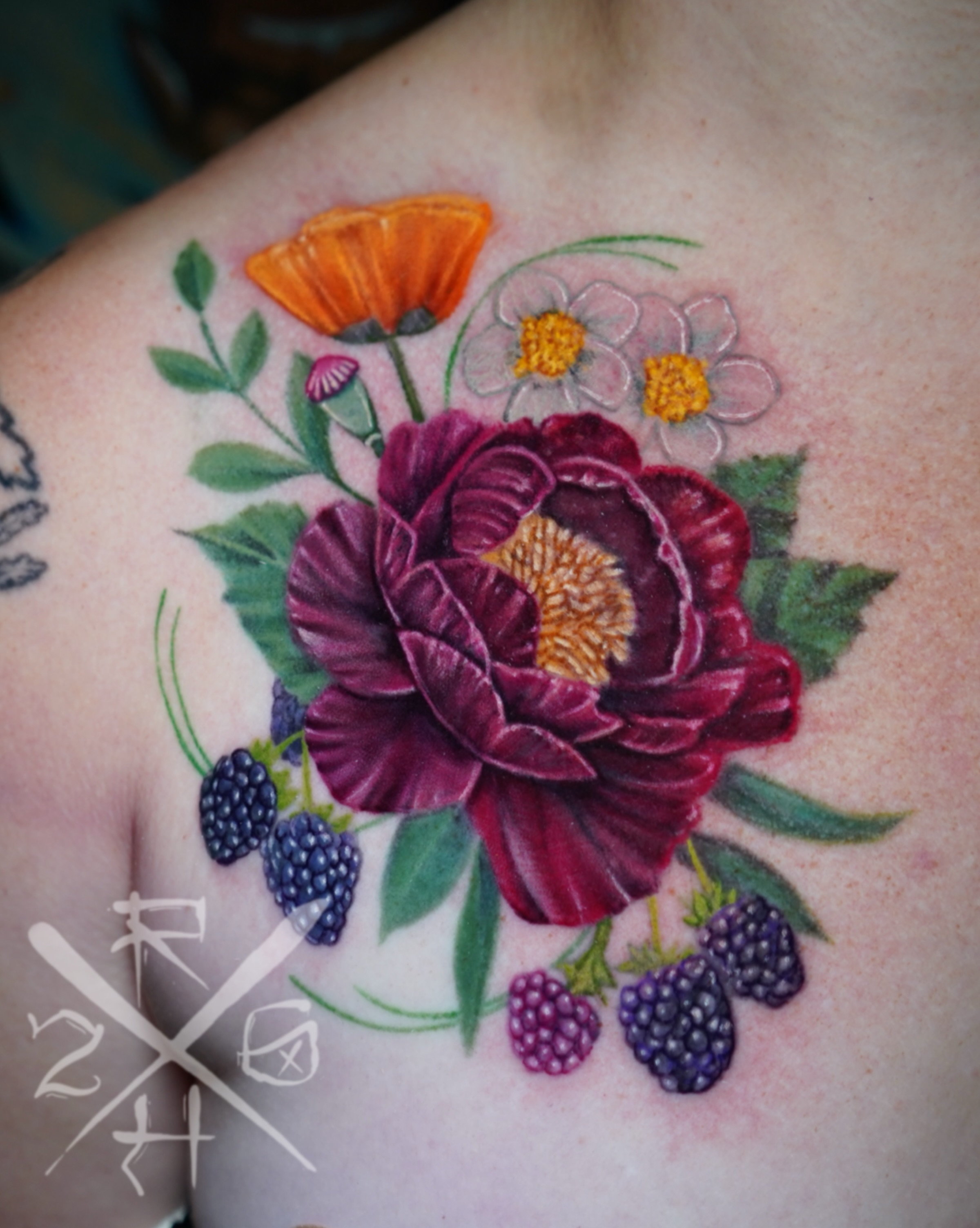 Flower bouquet realism tattoo on the shoulder by Ryan