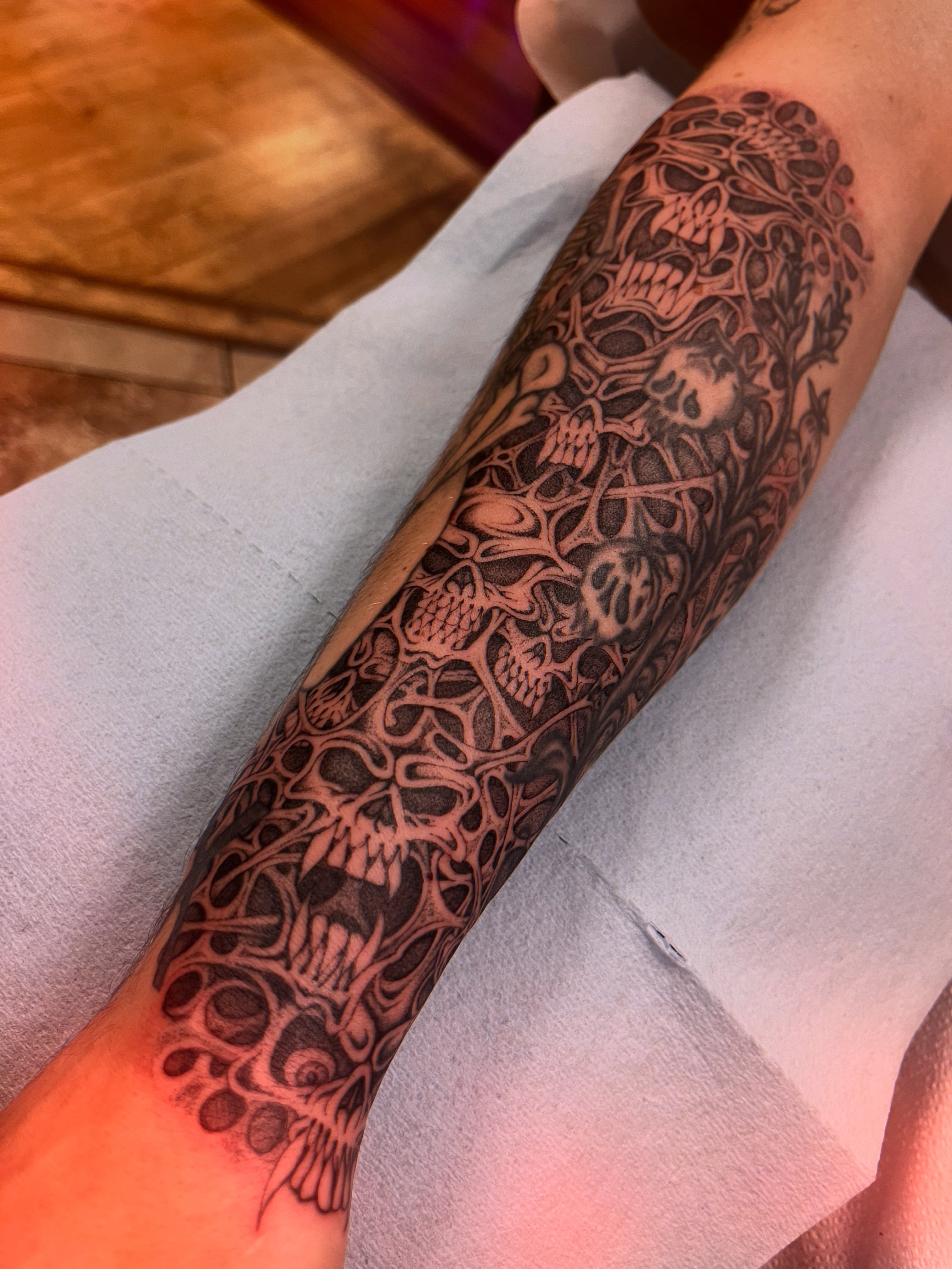 Skulls black and grey tattoo on the forearm by Maddie Blosser, Portland, Oregon