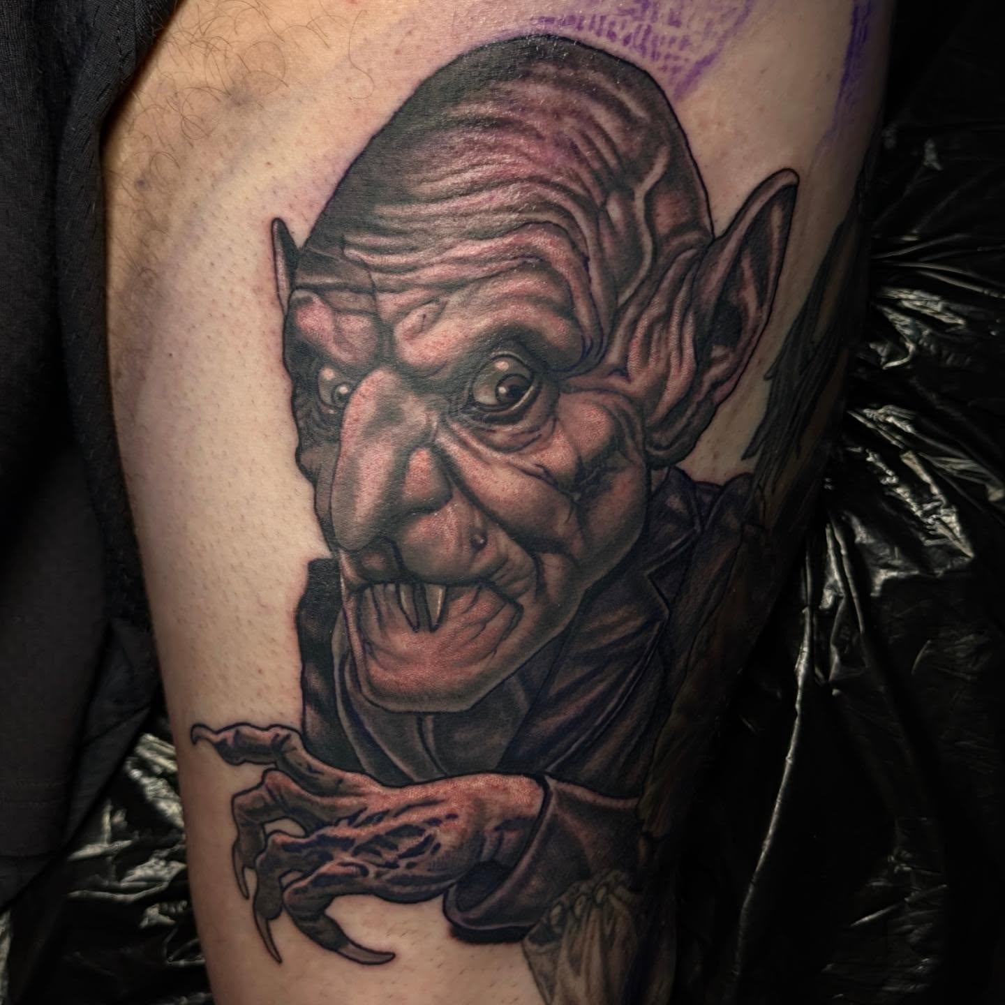 Orc-like creature realism tattoo on the thigh by Chicago Tattoo Artist New School Tattoos, Naperville, Illinois