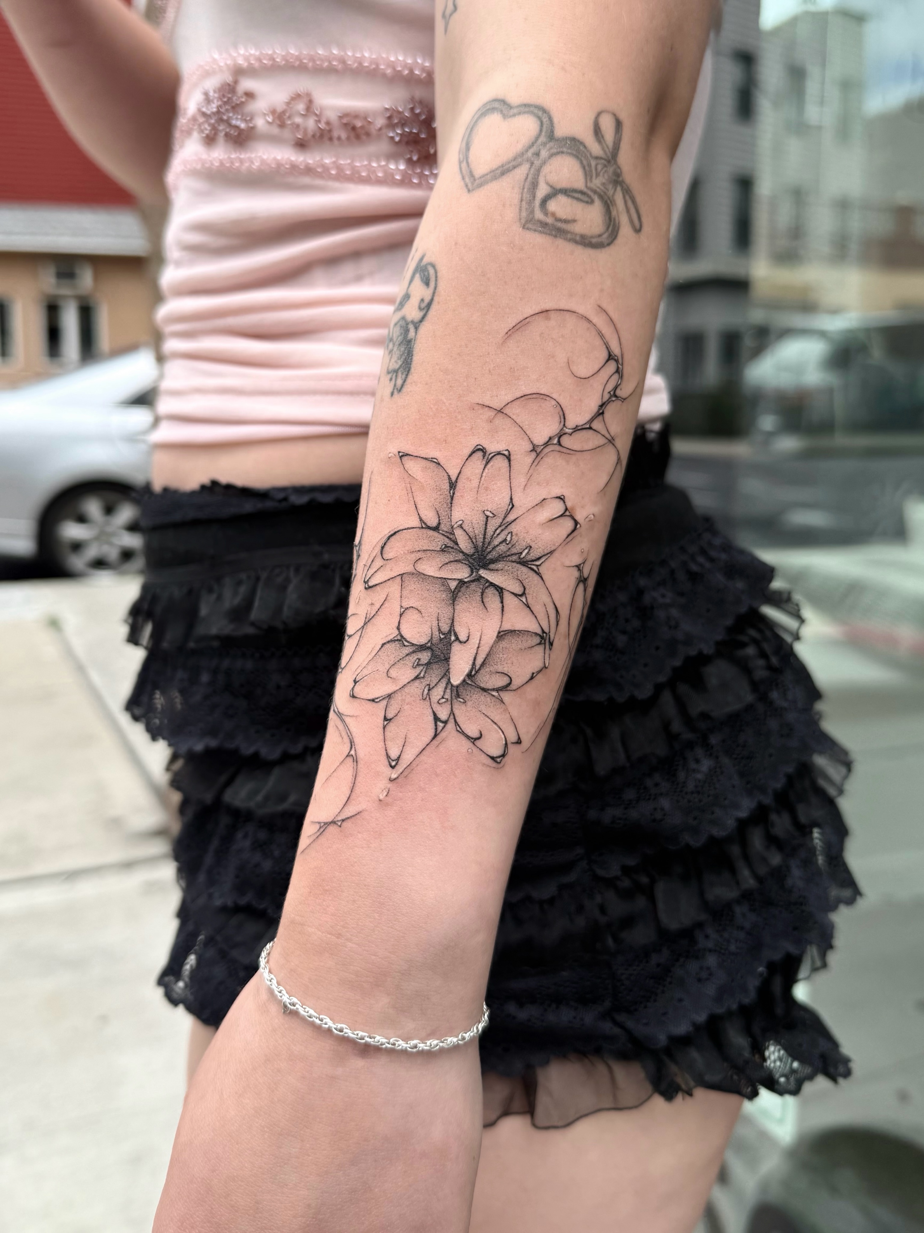 Flower black and grey tattoo on the forearm by ๐๐๐๐๐๐