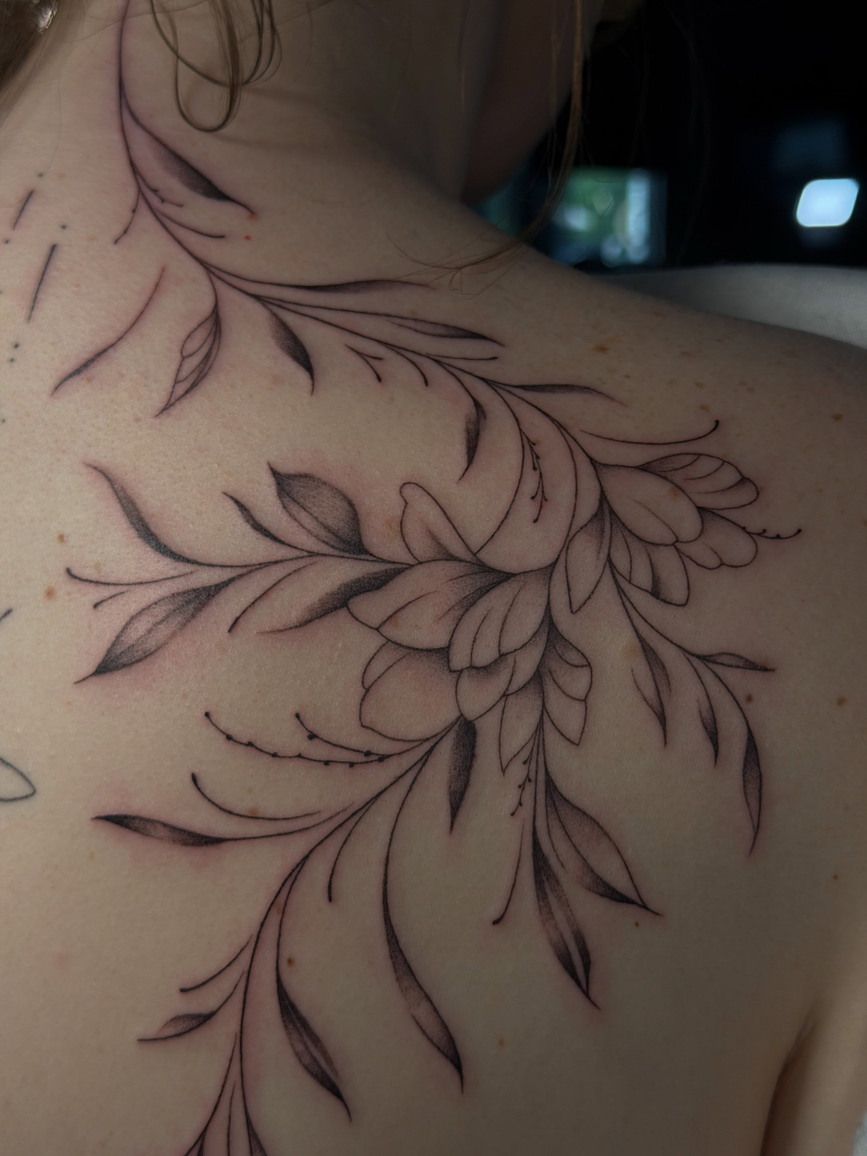 Floral arrangement black and grey tattoo on the shoulder by 𝔍𝔲𝔩𝔦𝔞, New York, New York