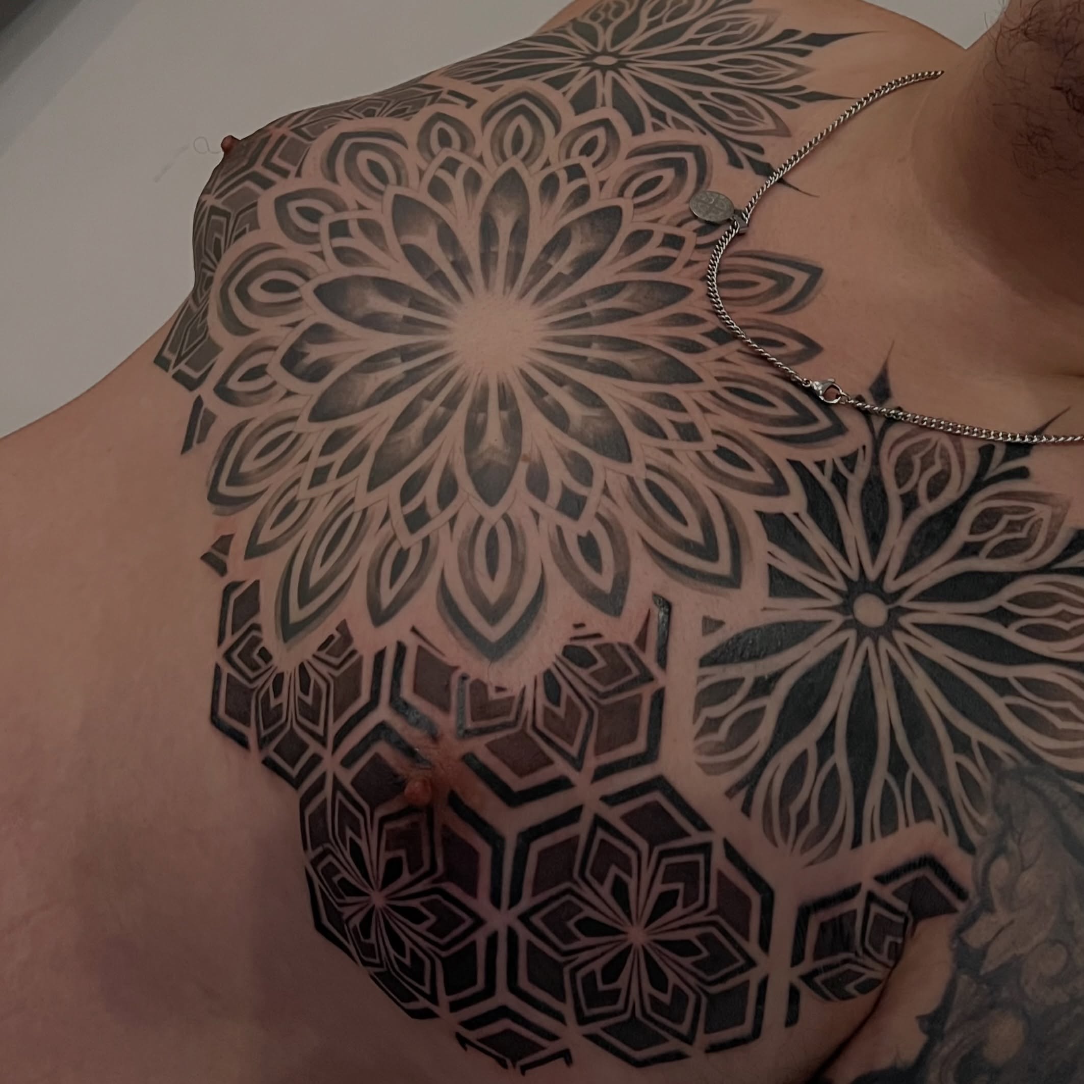 Geometric mandala geometric tattoo on the chest by Espi
