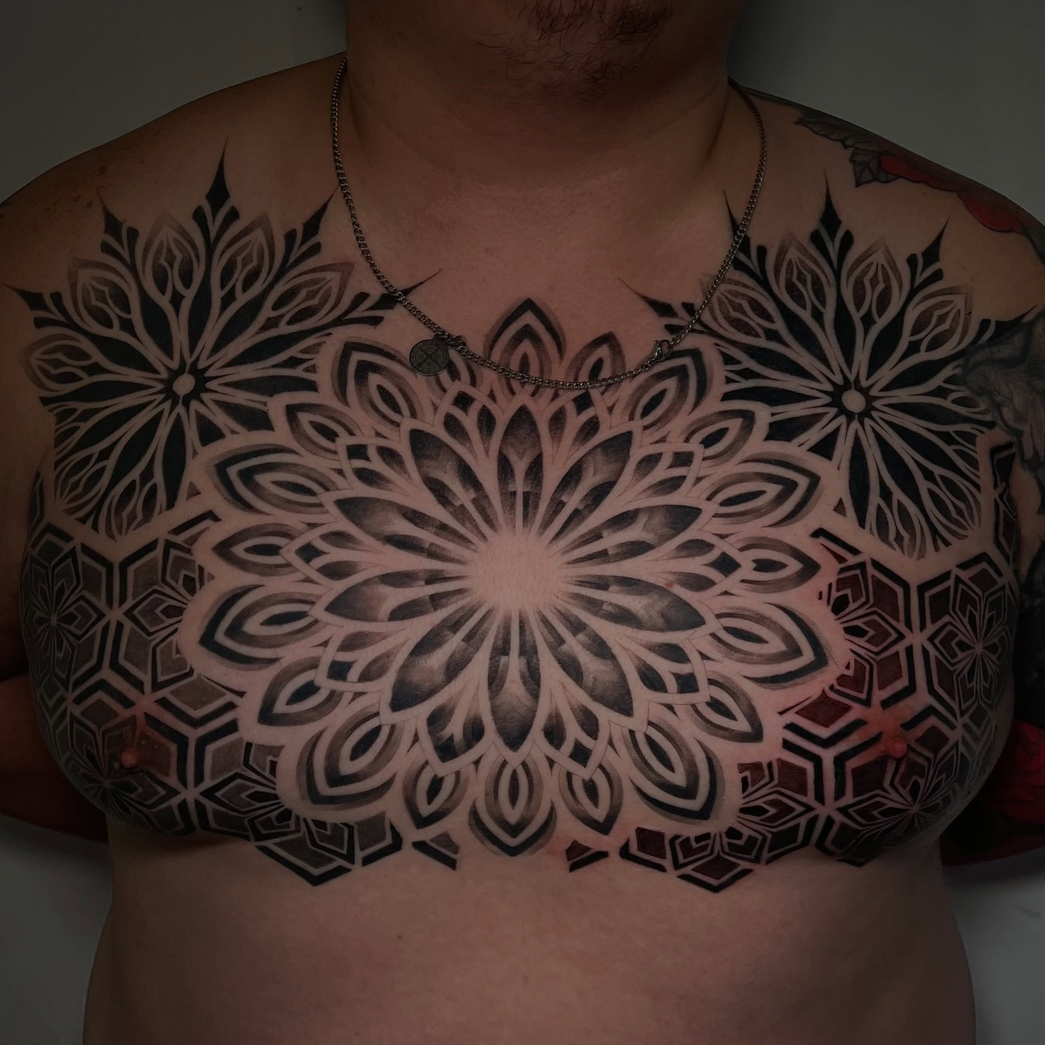 Geometric mandala geometric tattoo on the chest by Espi
