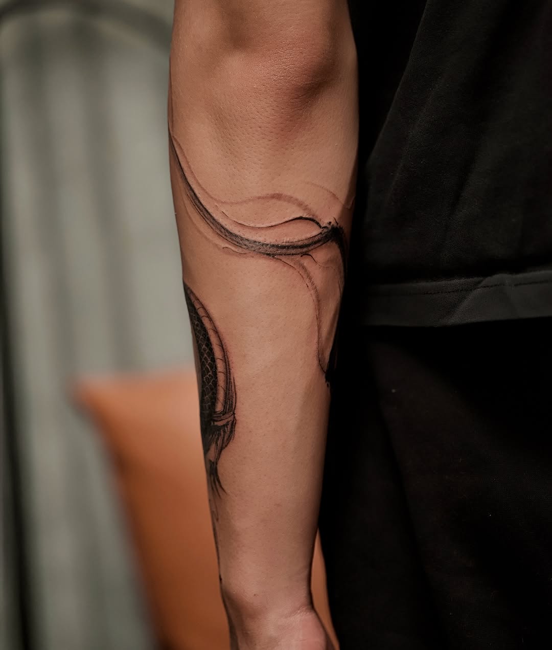 Abstract swirl black and grey tattoo on the forearm by Damon_modoink