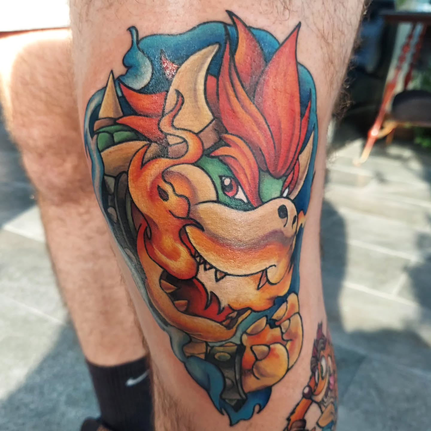 Bowser new school tattoo on the leg by Kari Rhoades, Marion, Iowa