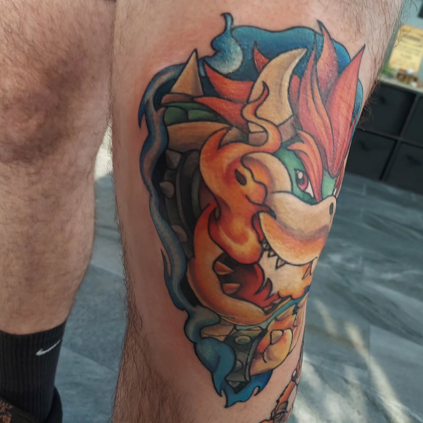 Bowser new school tattoo on the leg by Kari Rhoades, Marion, Iowa