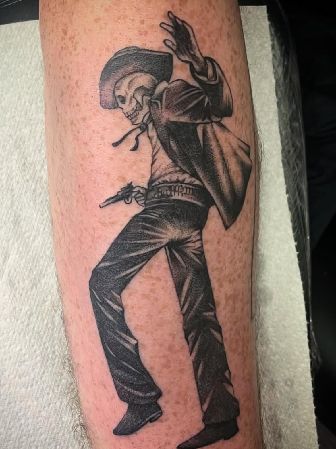Cowboy skeleton black and grey tattoo on the forearm by Grace derby tattooist, Derby