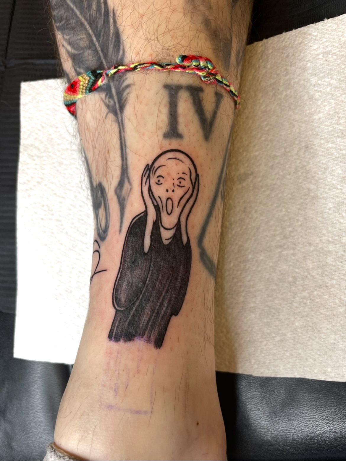The scream black and grey tattoo on the forearm by Grace derby tattooist, Derby