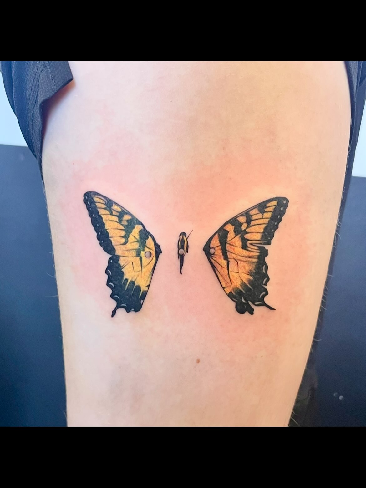 Butterfly realism tattoo on the thigh by Grace derby tattooist, Derby