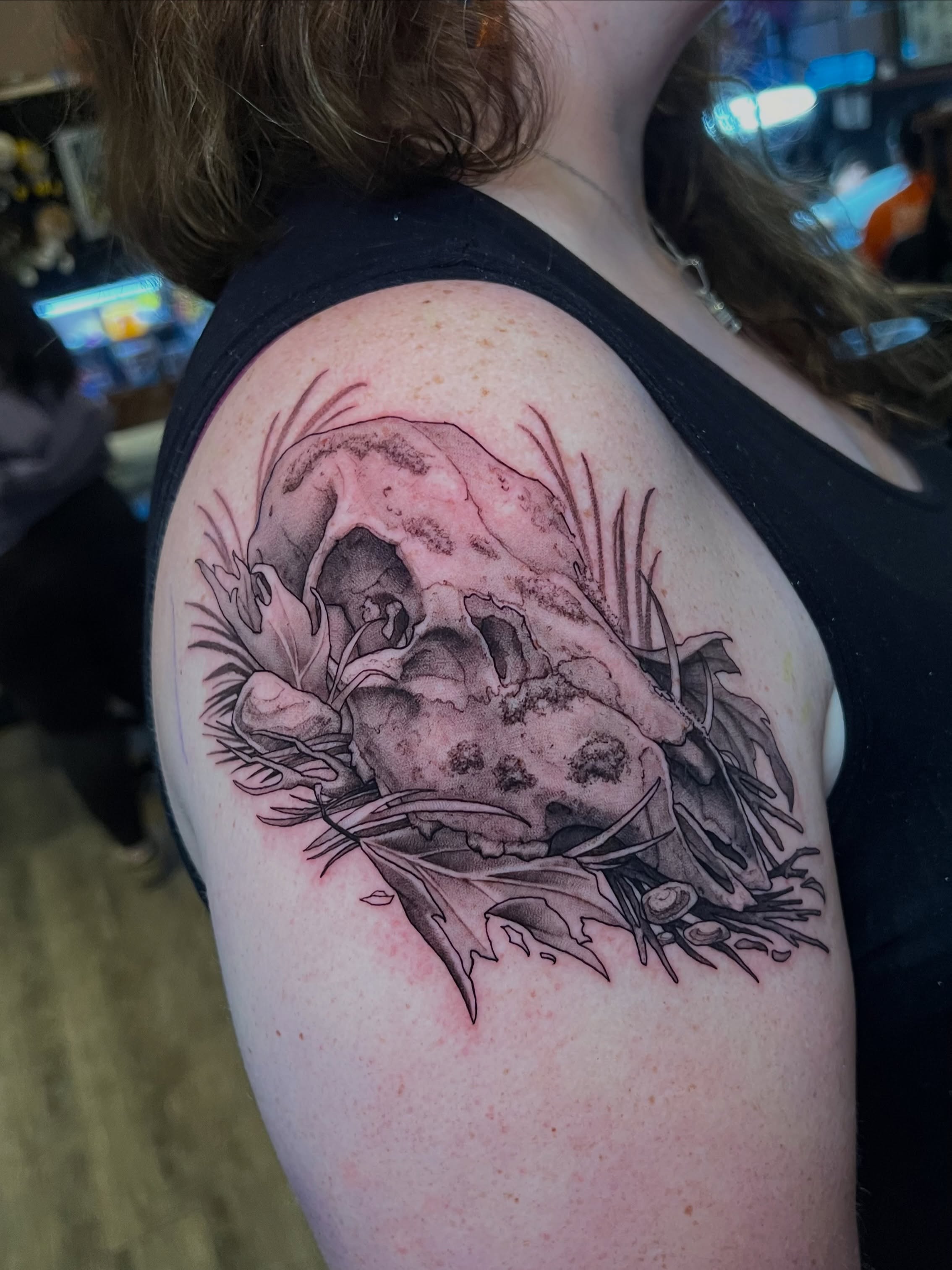 Skull realism tattoo on the shoulder by Millie, Maryville, Tennessee