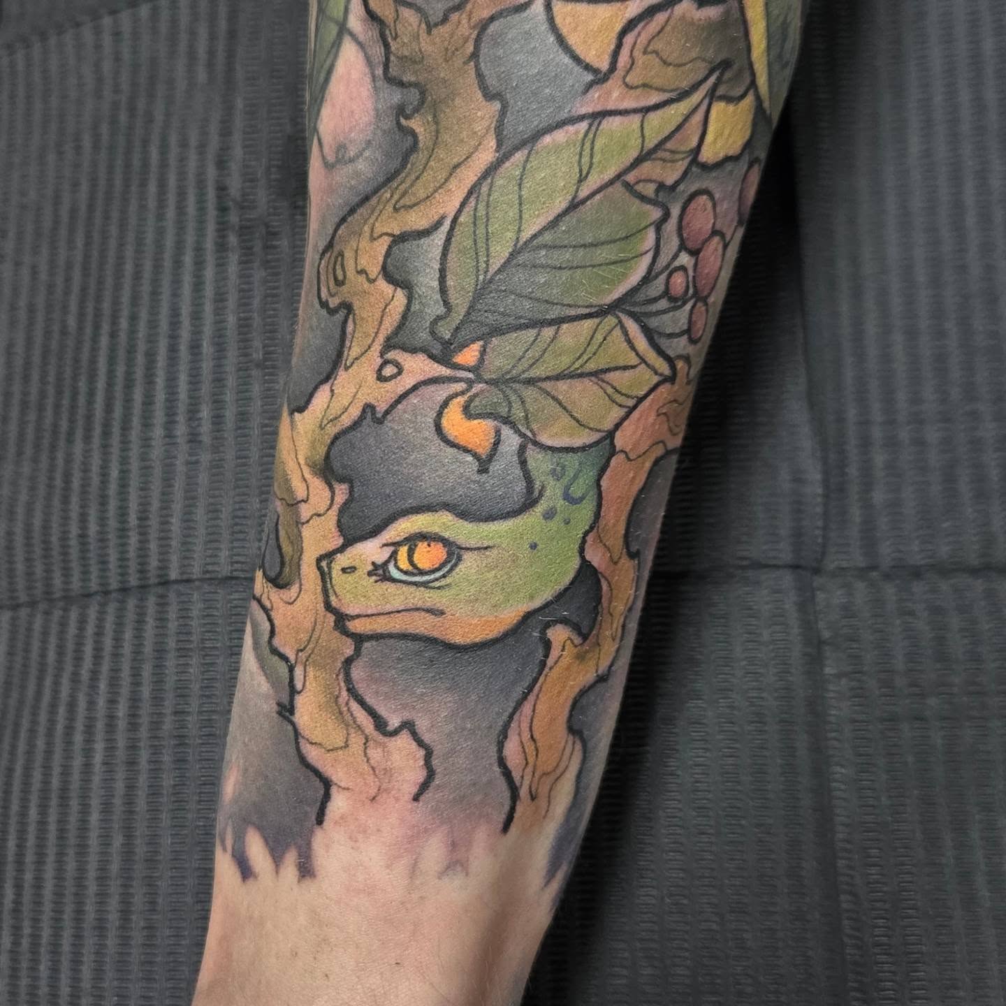 Frog realism tattoo on the forearm by Jamie Clinton