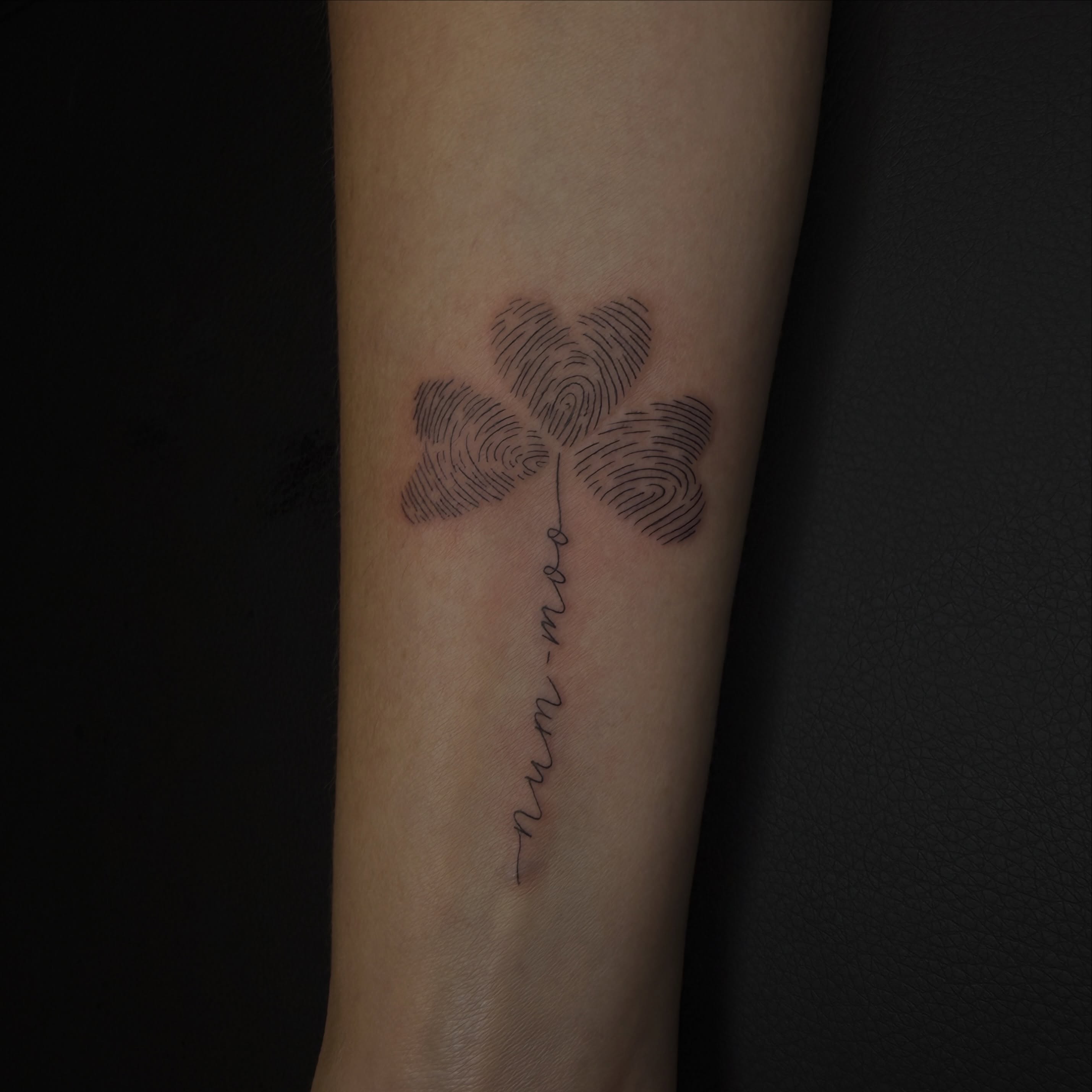 Fingerprint shamrock dotwork tattoo on the forearm by Pretty Ugly Tattoos