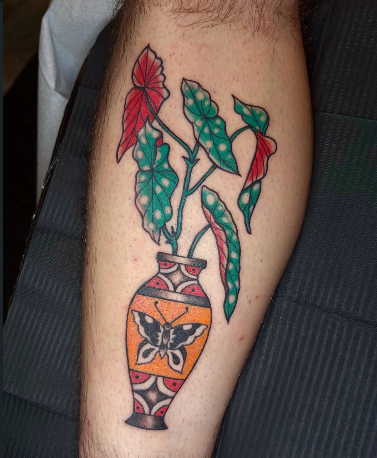Vase with plant American traditional tattoo on the forearm by Danelle ✶ Nashville Tattooer