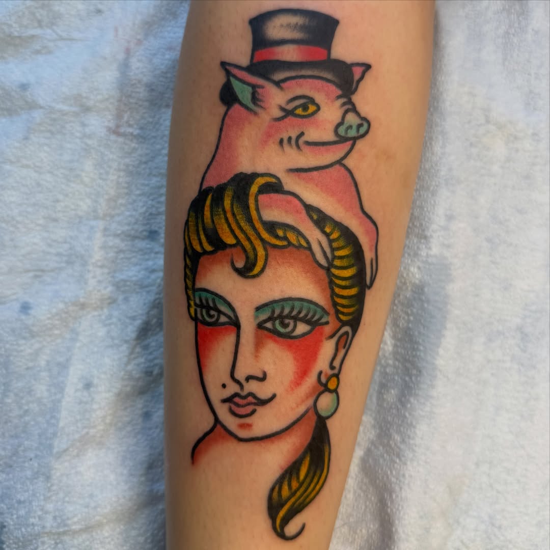 Woman with cat American traditional tattoo on the forearm by Tyler
