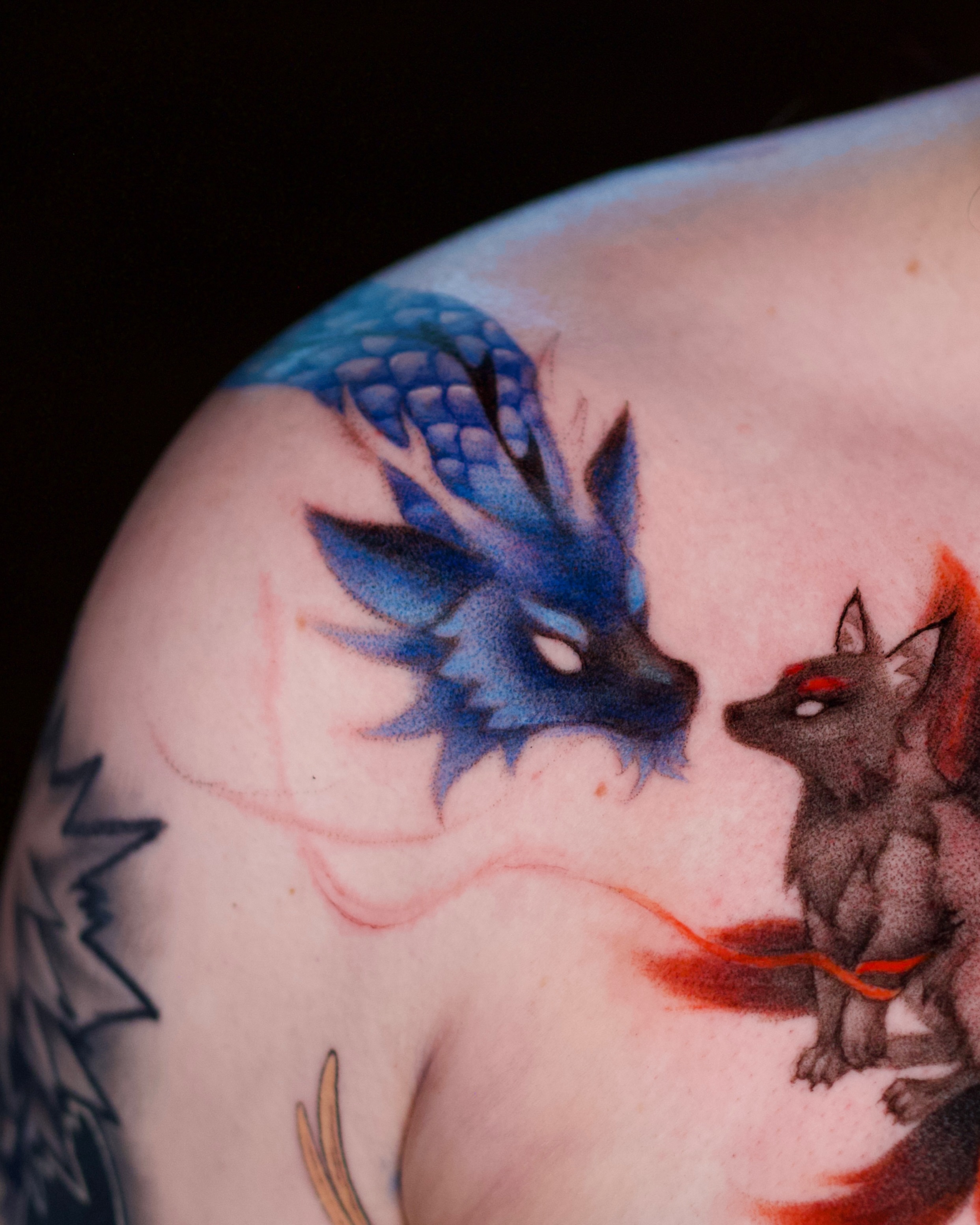 Tattoo by @toki.tattoos — realism, dotwork