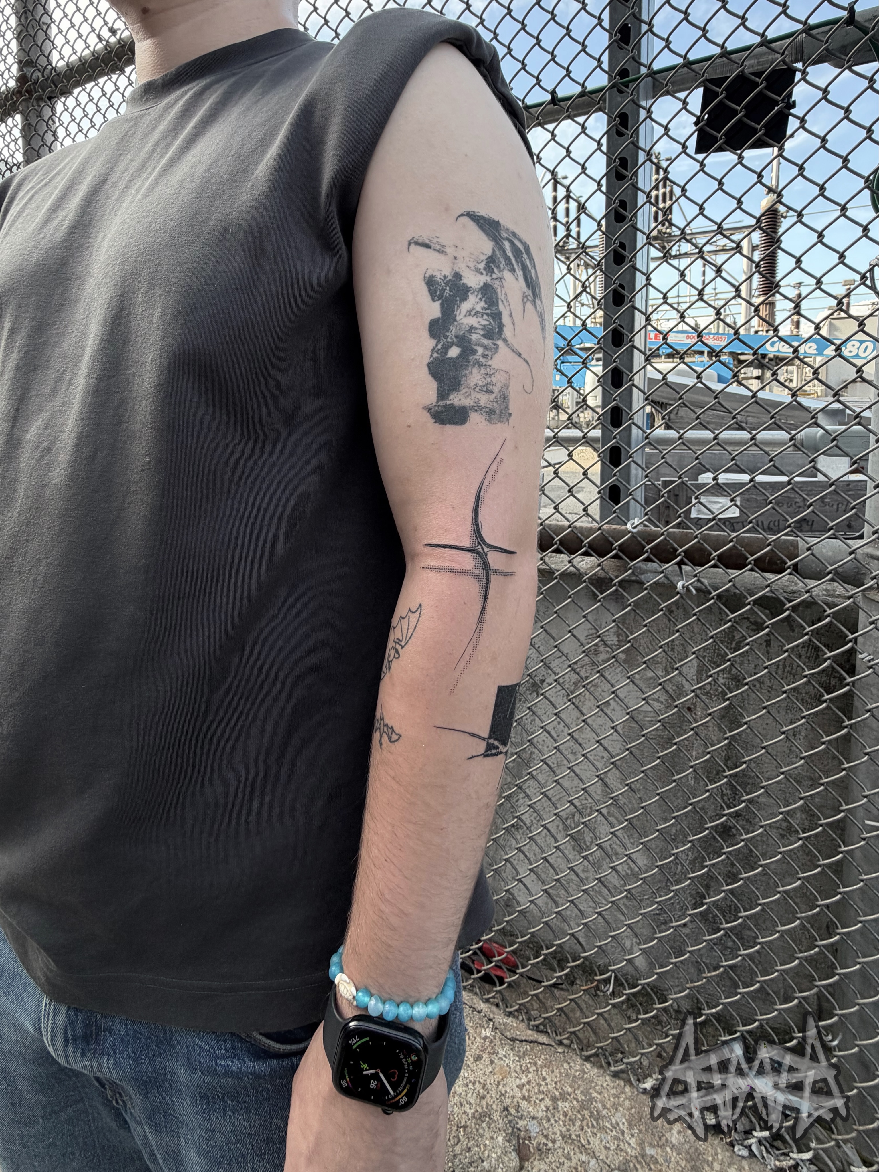 Statue and abstract shapes geometric tattoo on the forearm by Haza
