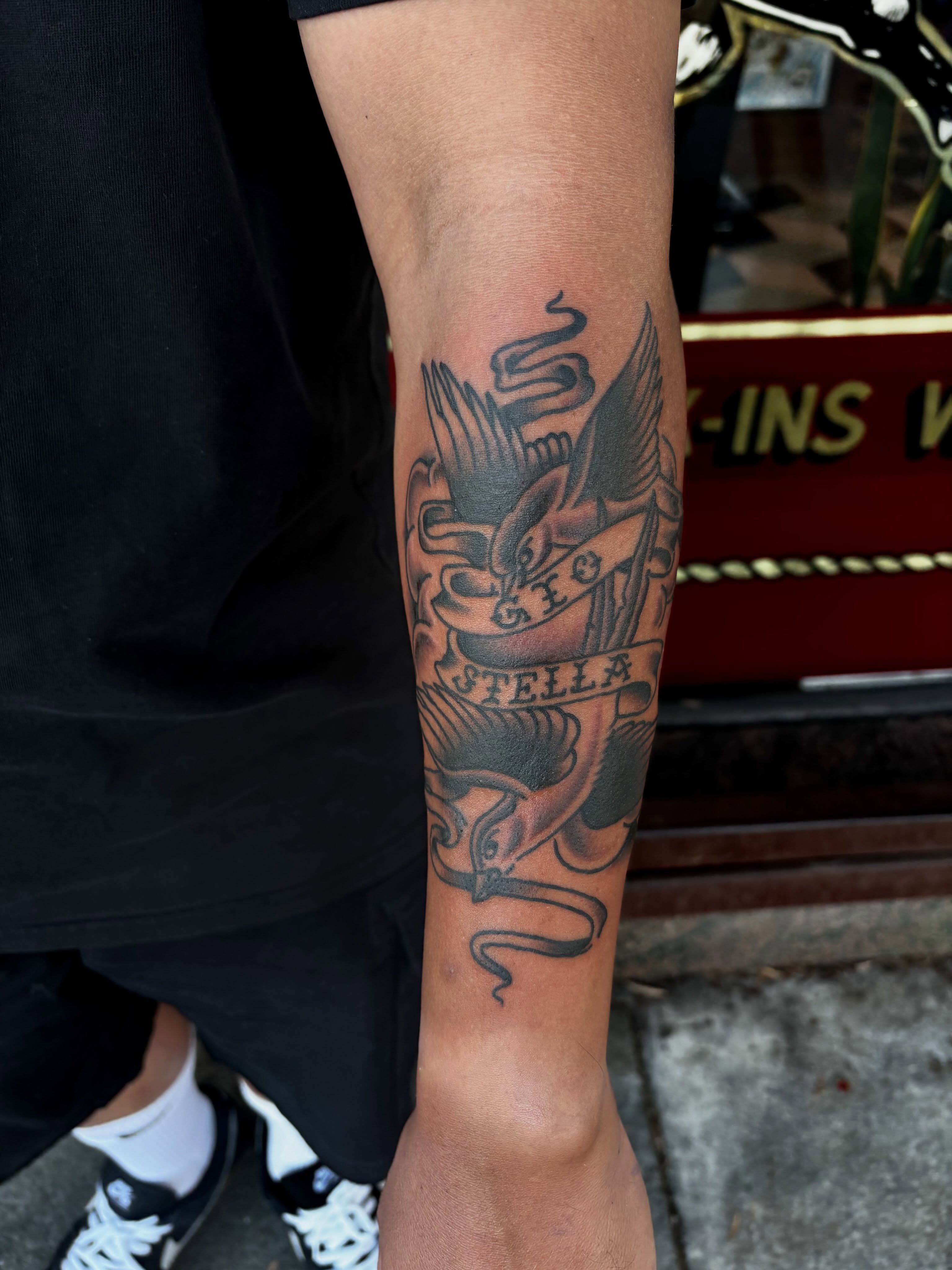 Eagle and snake American traditional tattoo on the forearm by Alyssa L'Heureux🕴🏼, Los Angeles, California