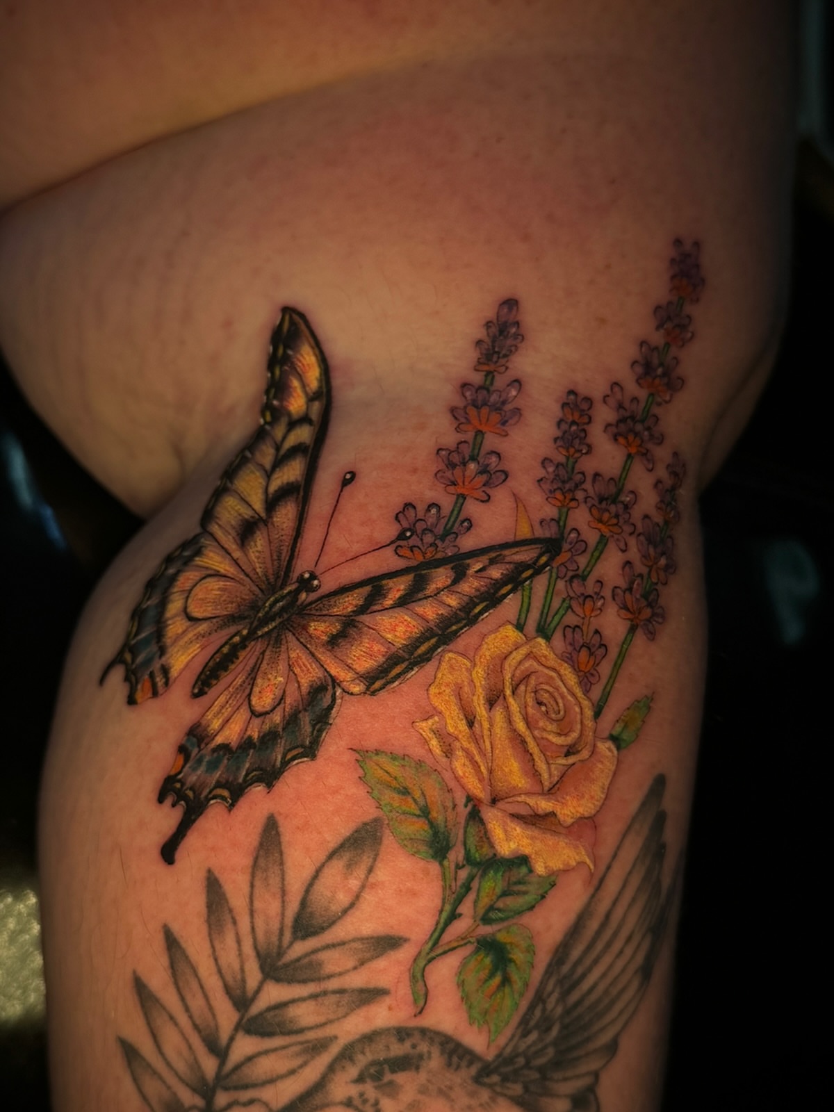Butterfly and rose realism tattoo on the thigh by star🪭