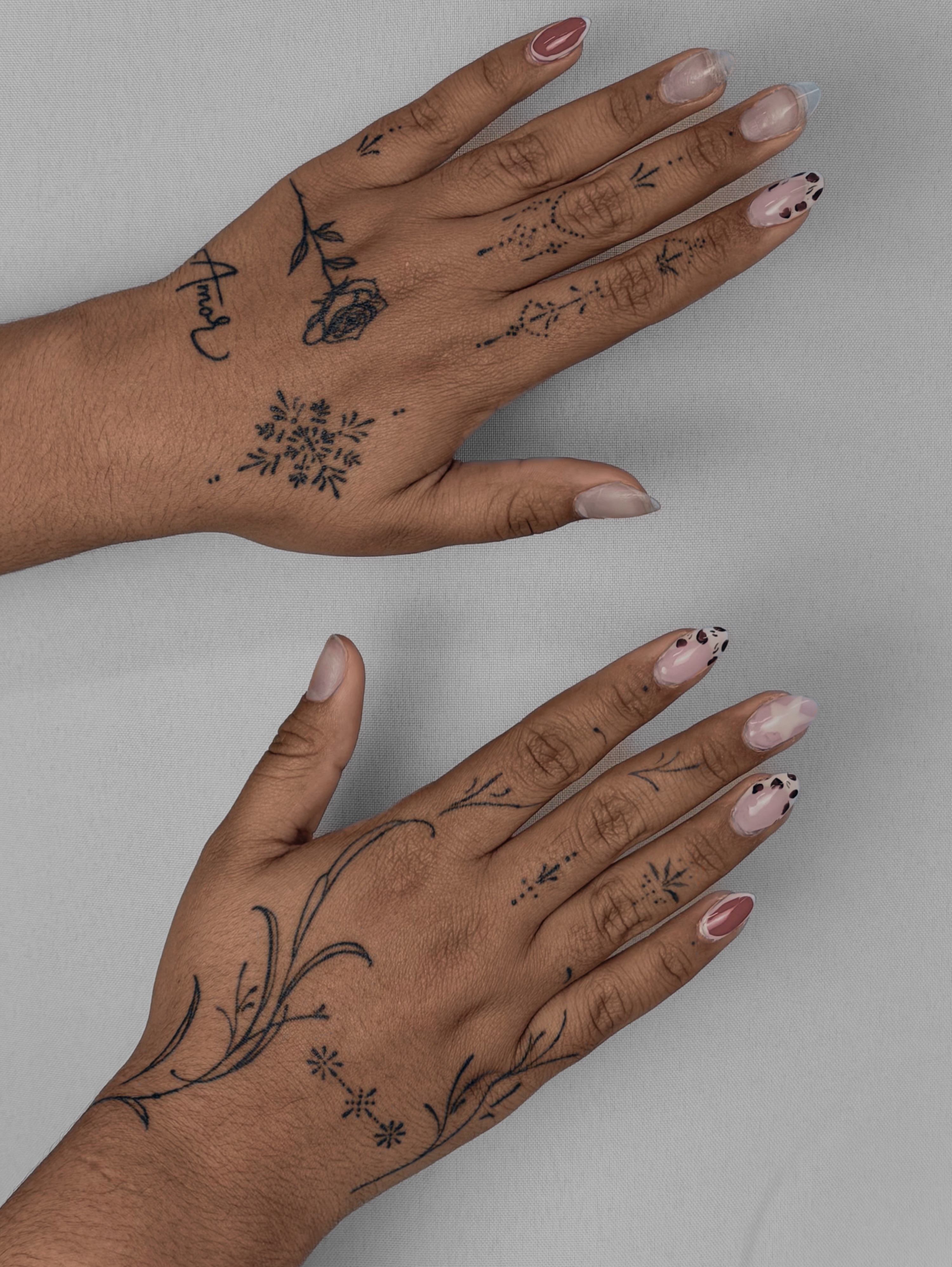 Floral dotwork tattoo on the hand by Charlotte