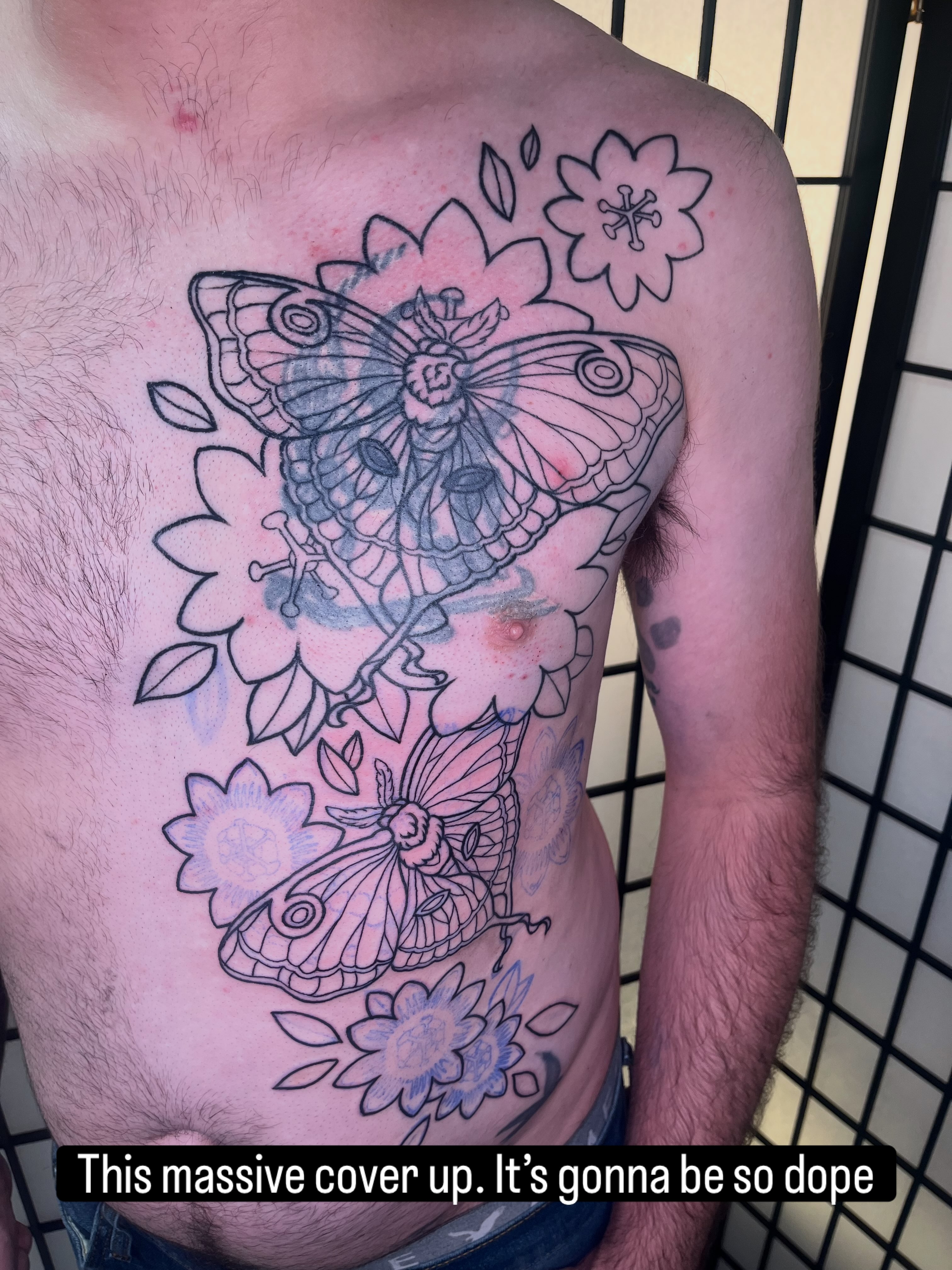 Butterfly and flowers American traditional tattoo on the chest by Lauryn Dunkle
