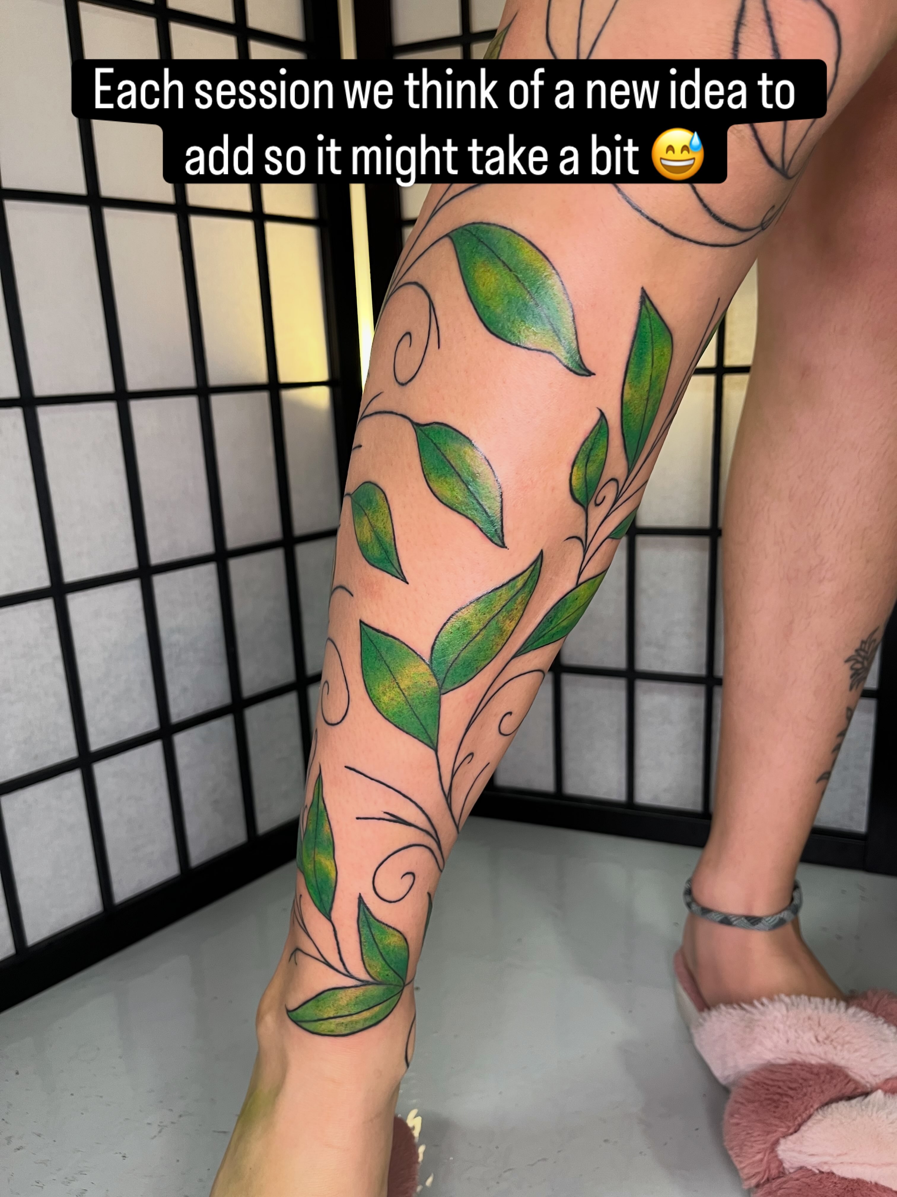 Leaf vine fine line tattoo on the calf by Lauryn Dunkle