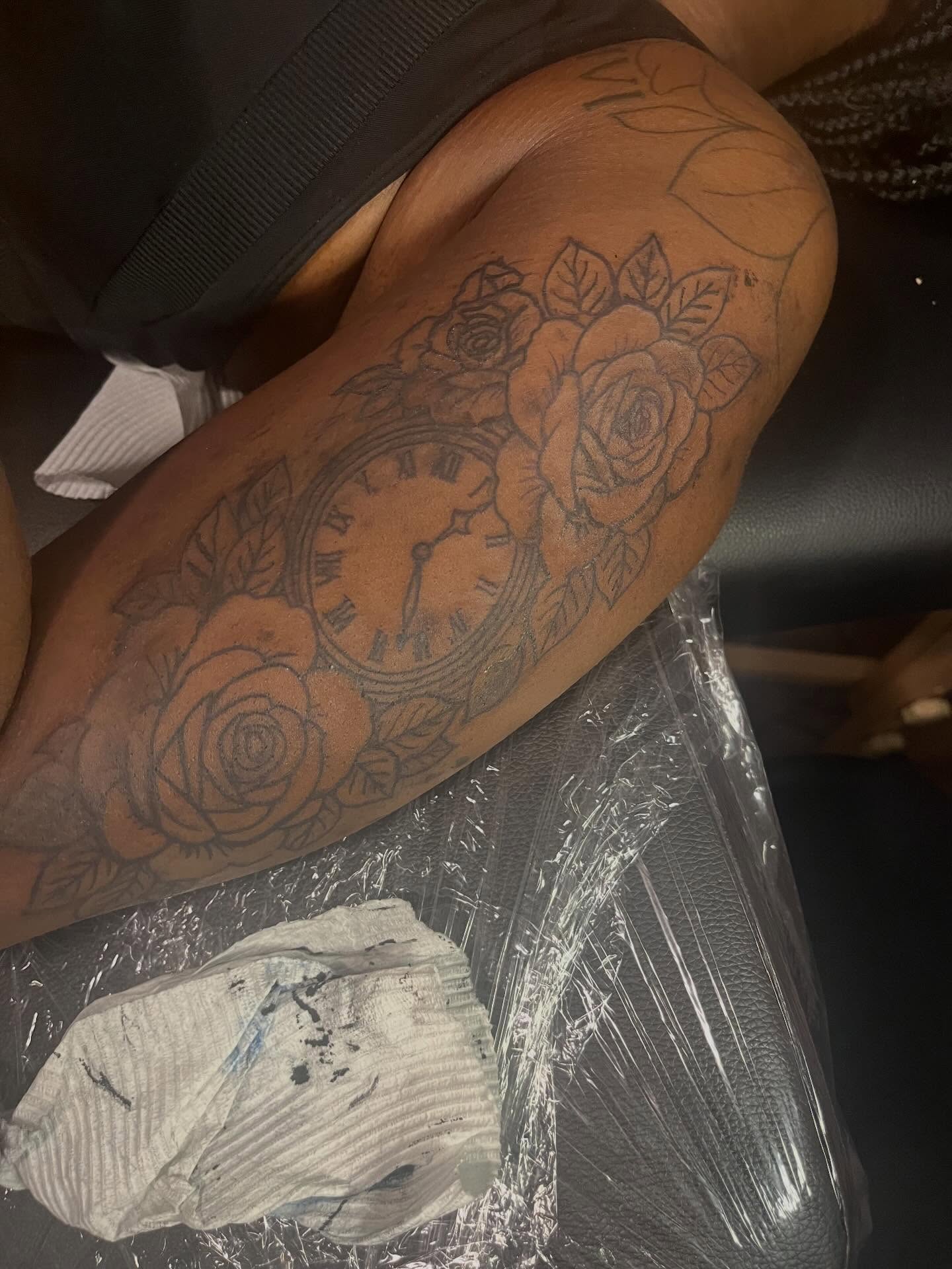Clock and roses black and grey tattoo on the thigh by π Westside