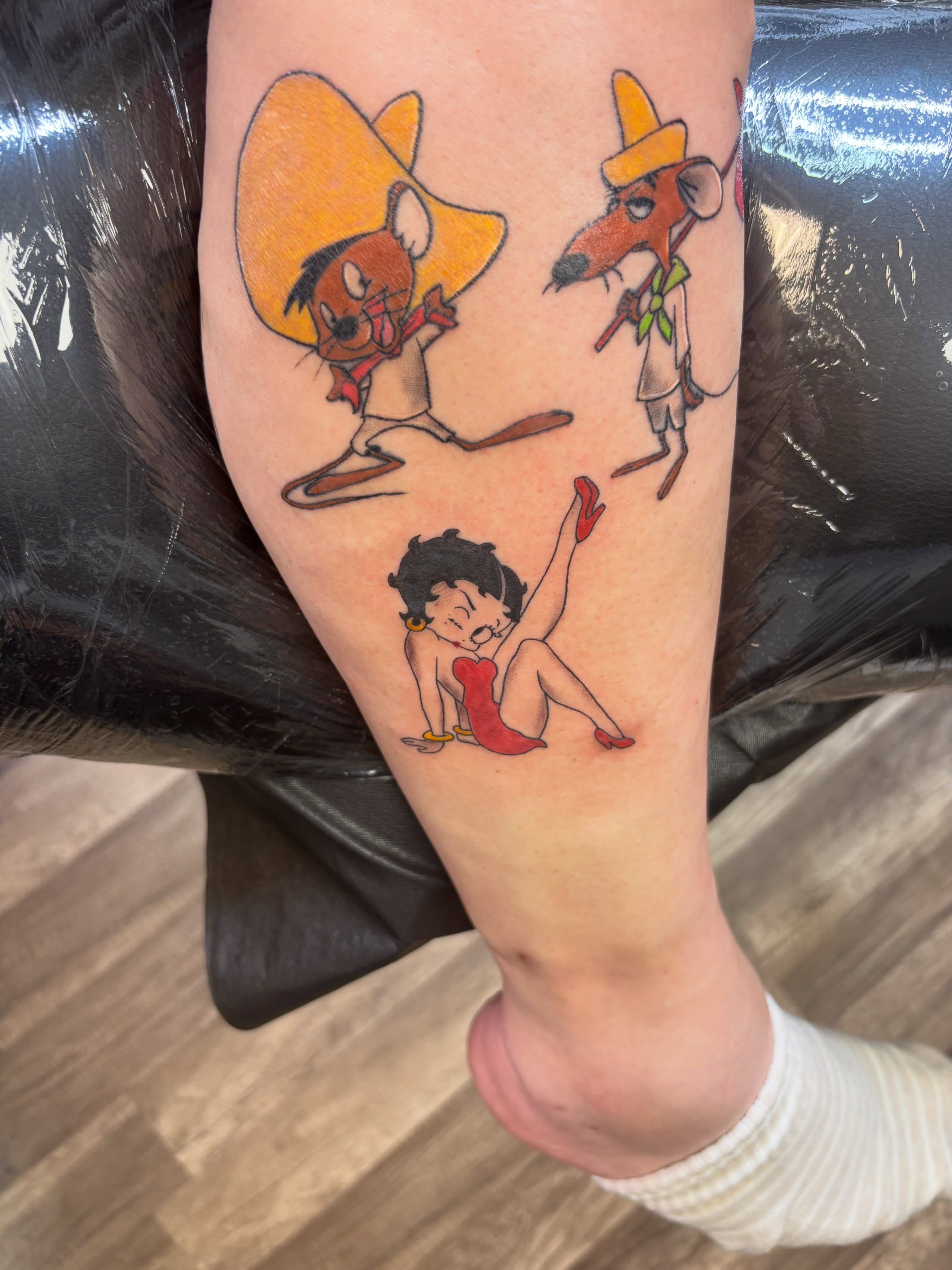 Betty Boop and friends American traditional tattoo on the forearm by Rain David