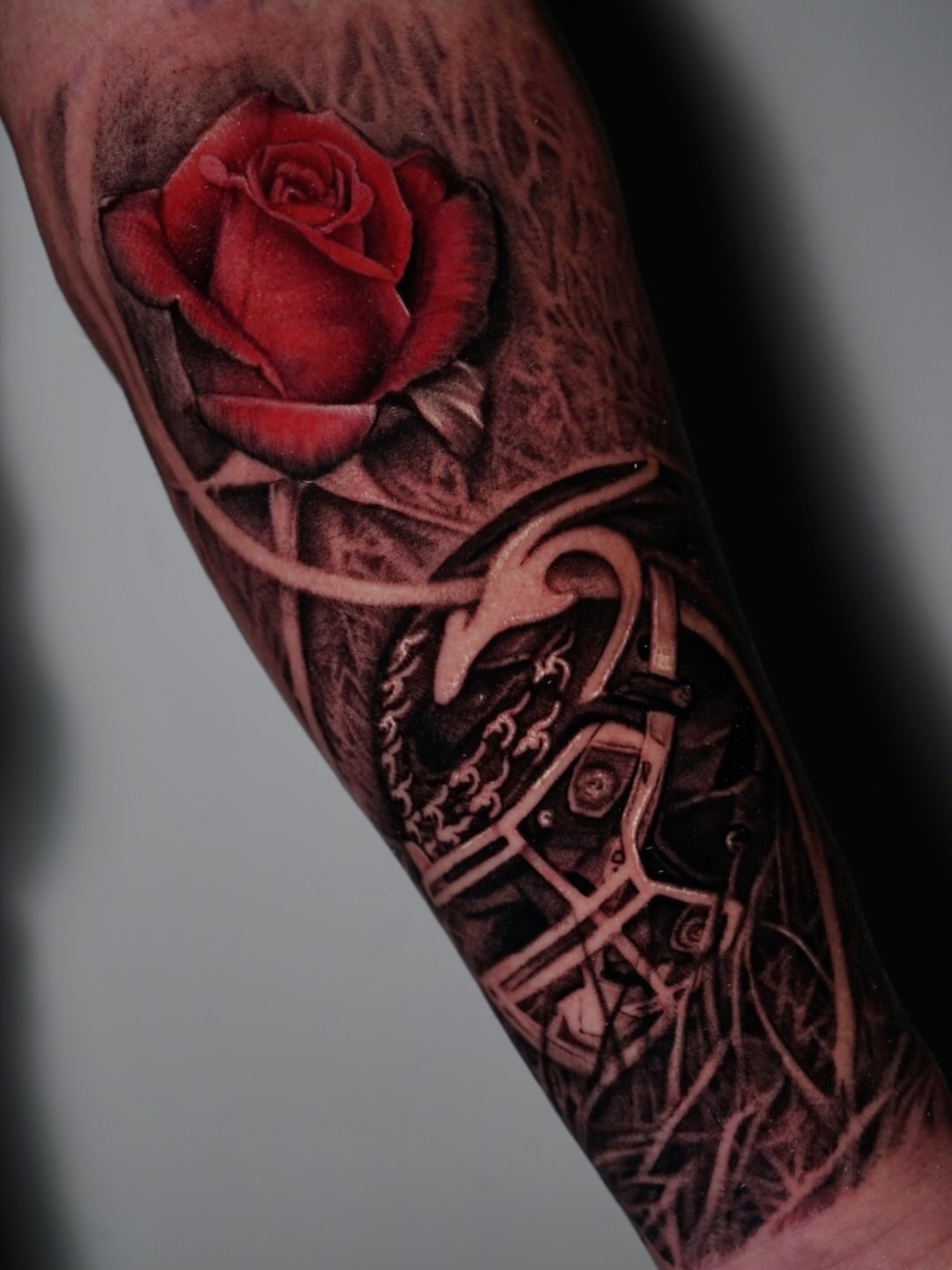 Red rose realism tattoo on the forearm by Sabrina Lakhaysy, Fort Worth, Texas