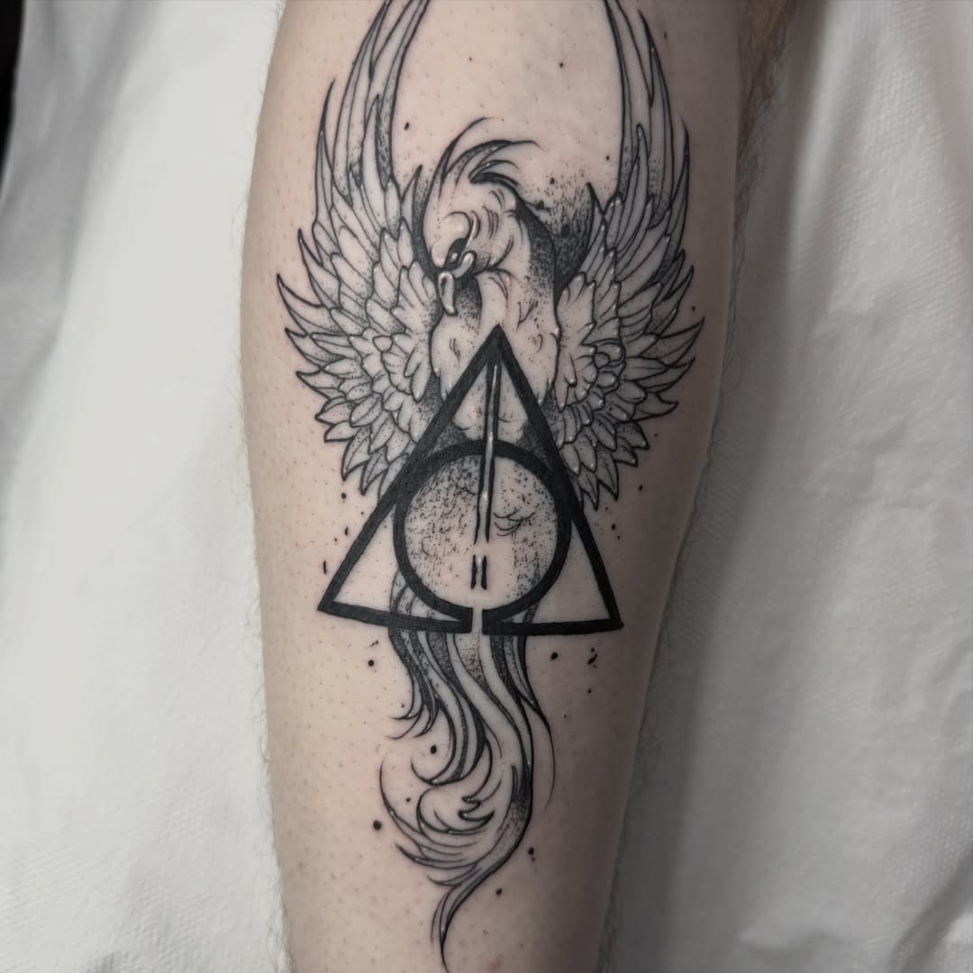 Deathly hallows symbol dotwork tattoo on the forearm by Aiden Shaw