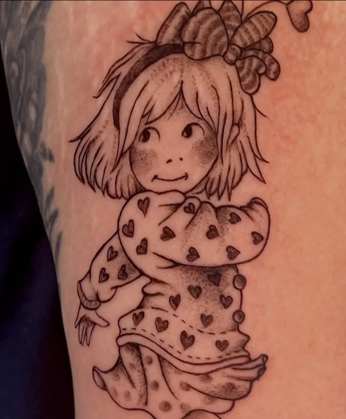 Child with heart-patterned dress black and grey tattoo on the forearm by tattooz by megz
