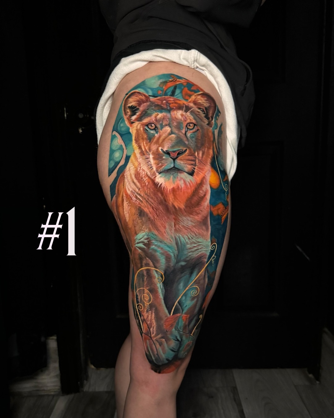 Lion realism tattoo on the thigh by Davier Del Castillo