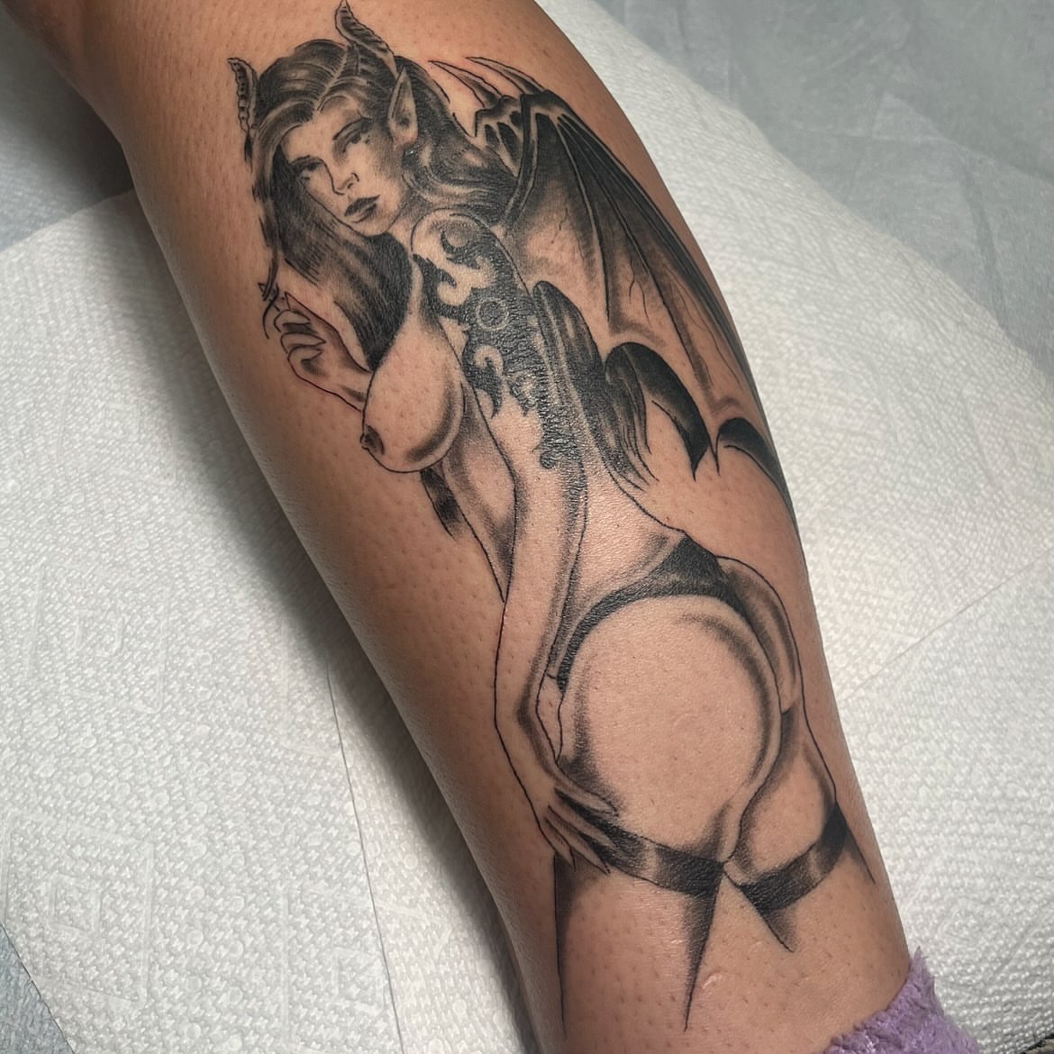 Demon black and grey tattoo on the forearm by Chrissy Ungrew Tattoos, Covington, Kentucky