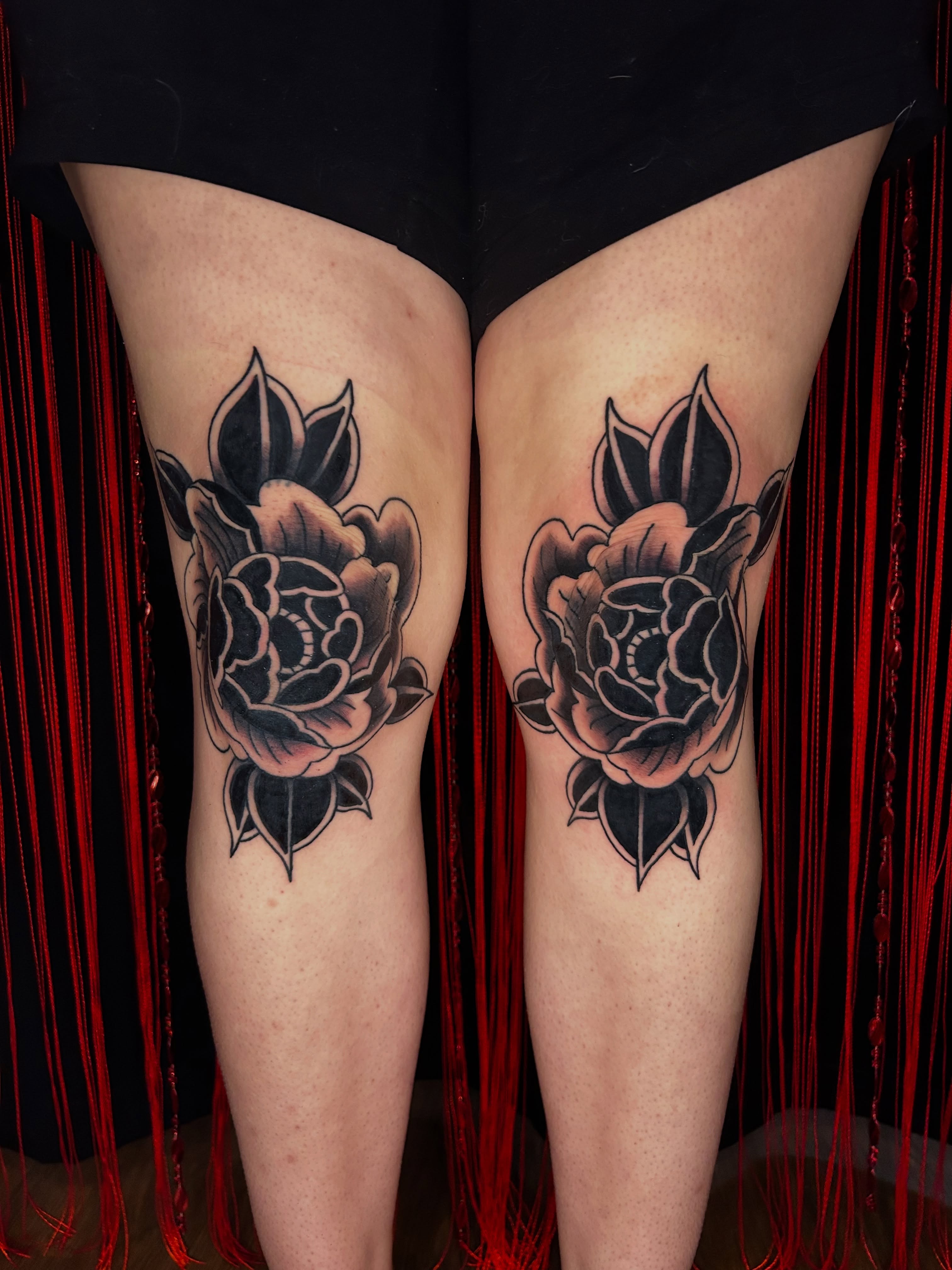 Rose American traditional tattoo on the thigh by Kurt, Somerville, Massachusetts