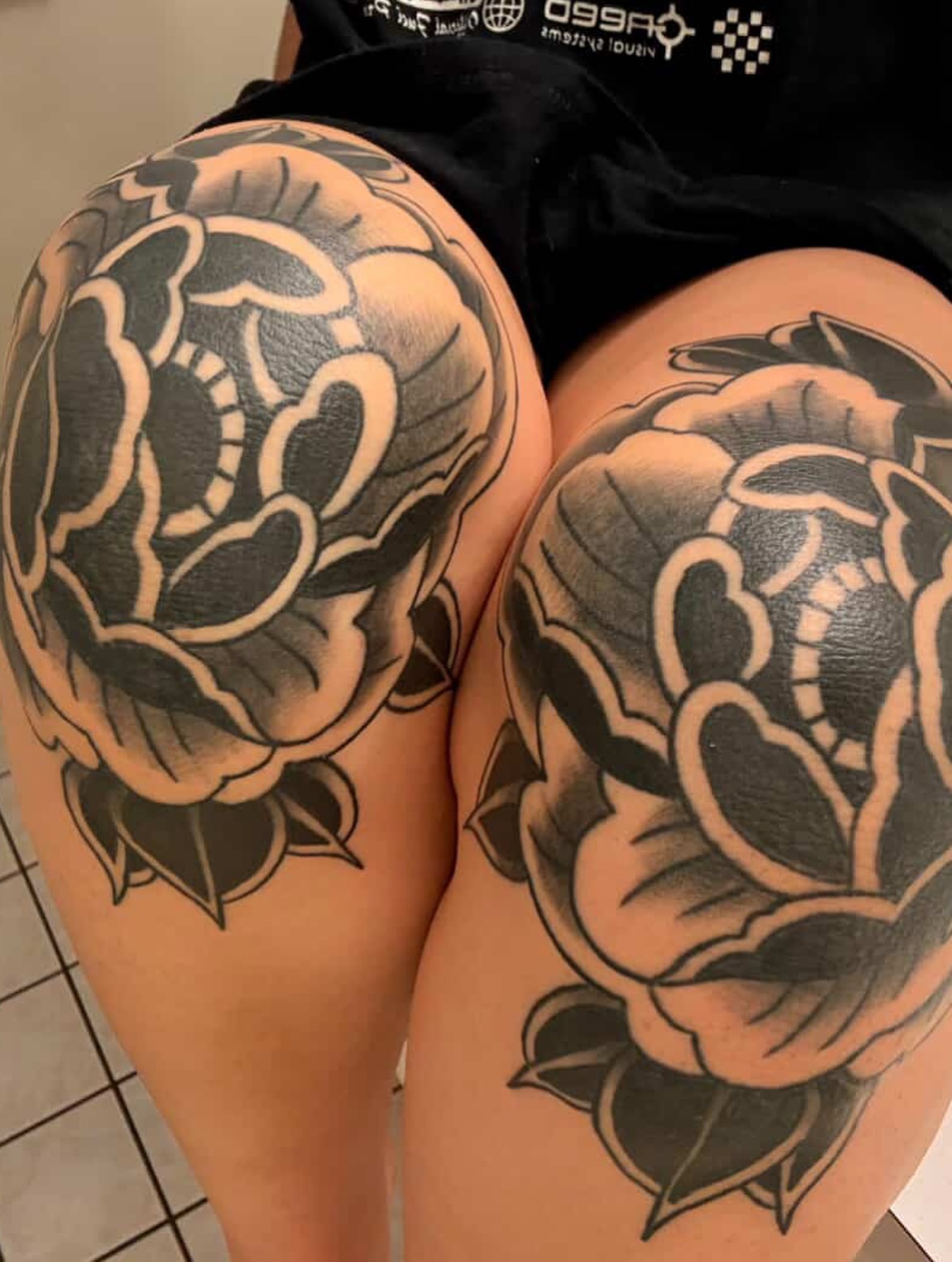 Rose American traditional tattoo on the thigh by Kurt, Somerville, Massachusetts