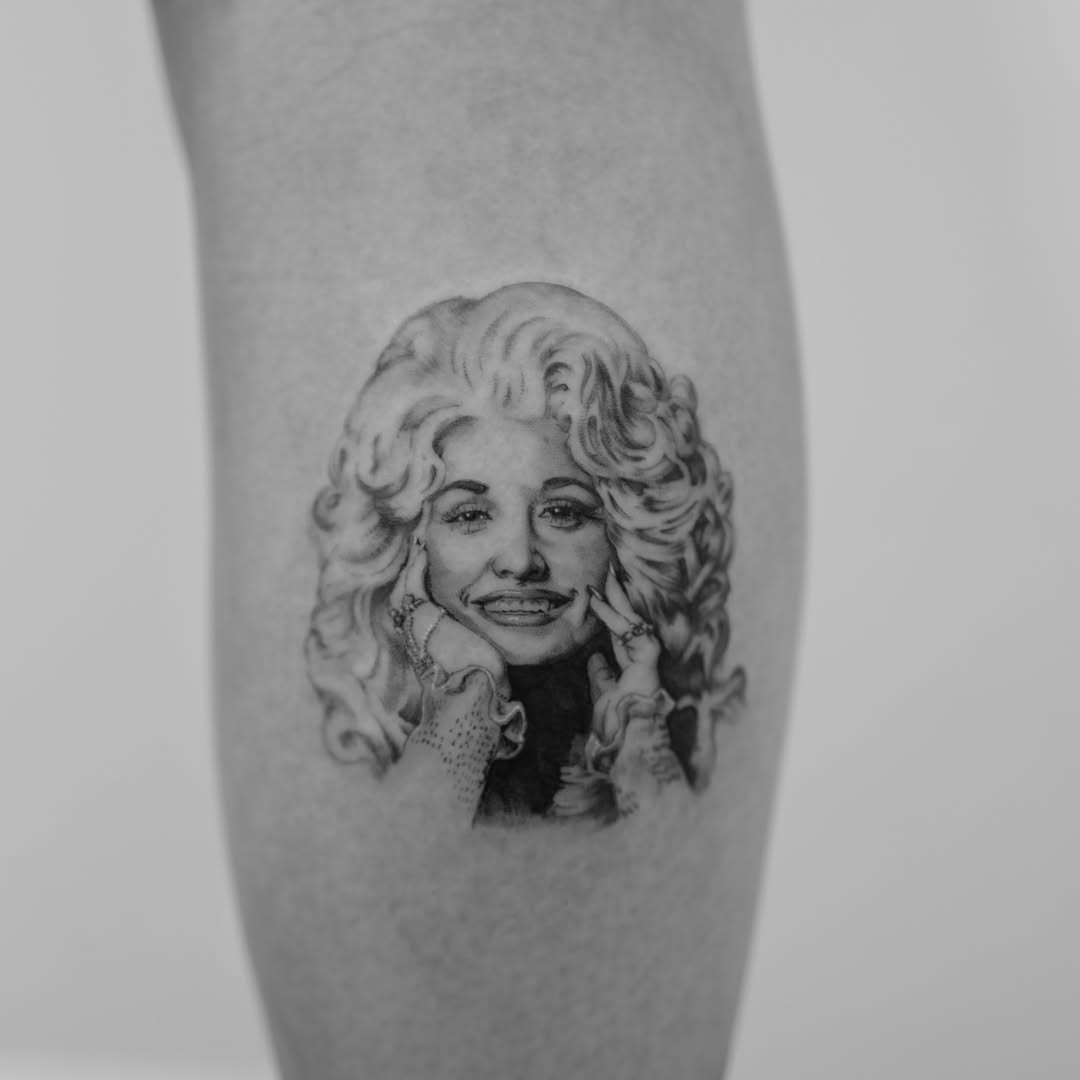 Portrait realism tattoo on the forearm by Ross Clark Tattoos
