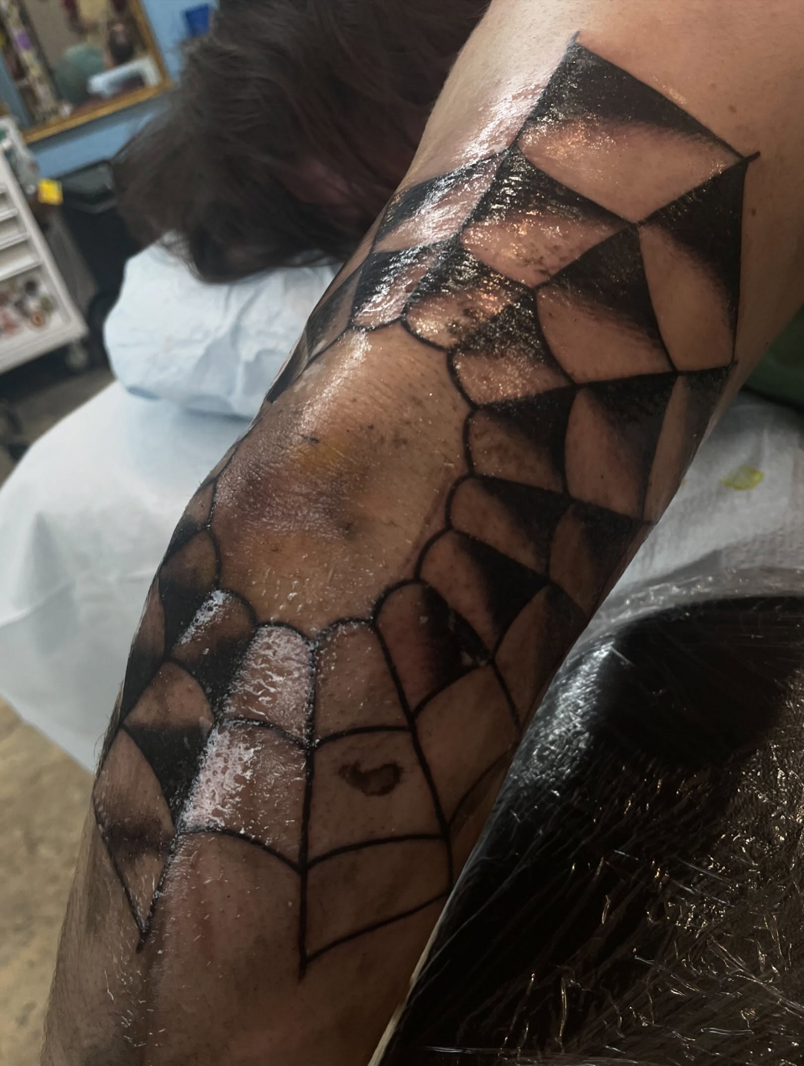 Geometric pattern geometric tattoo on the forearm by Lainy Lou