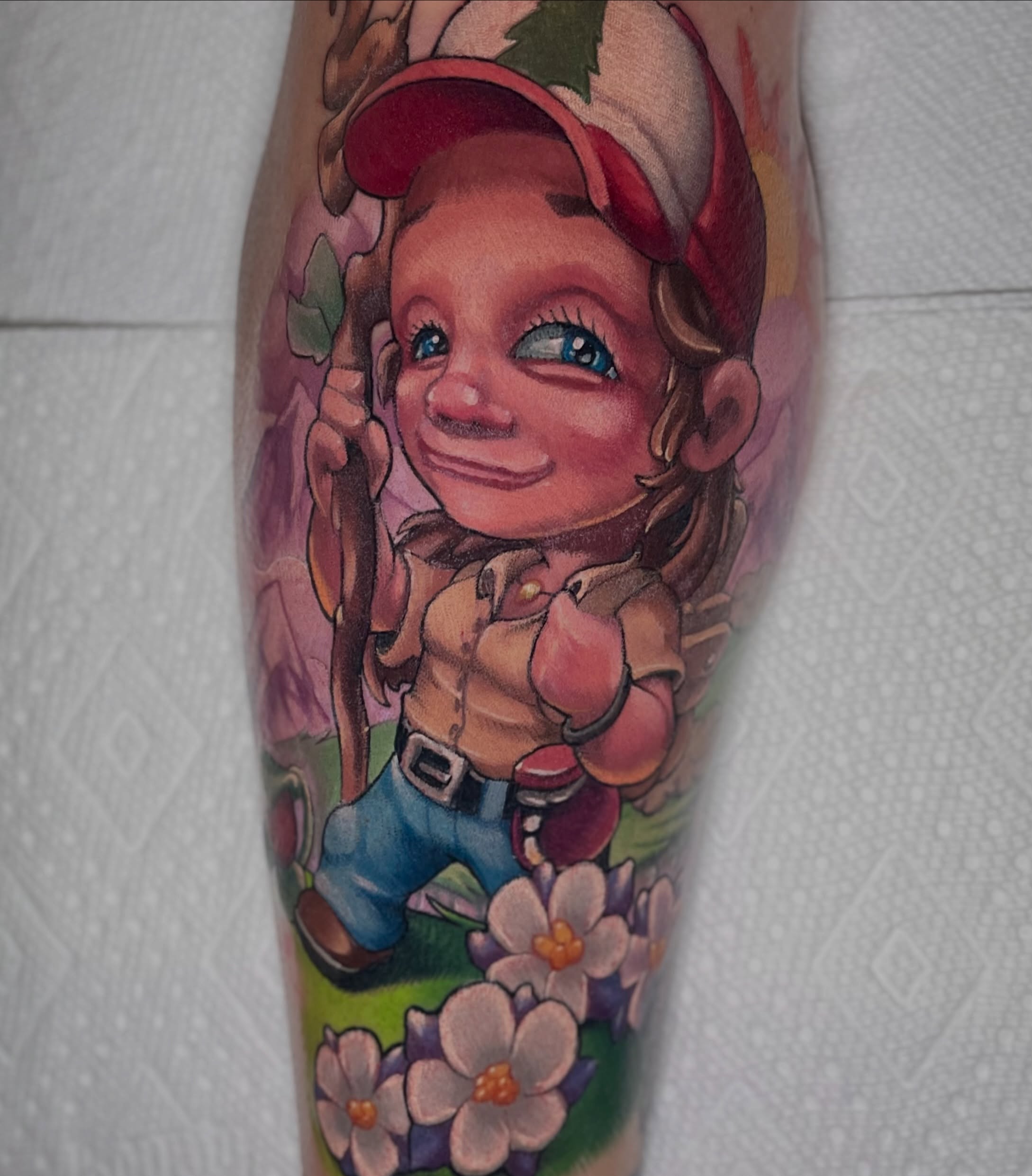 Child with baseball cap realism tattoo on the forearm by Jacob Webb